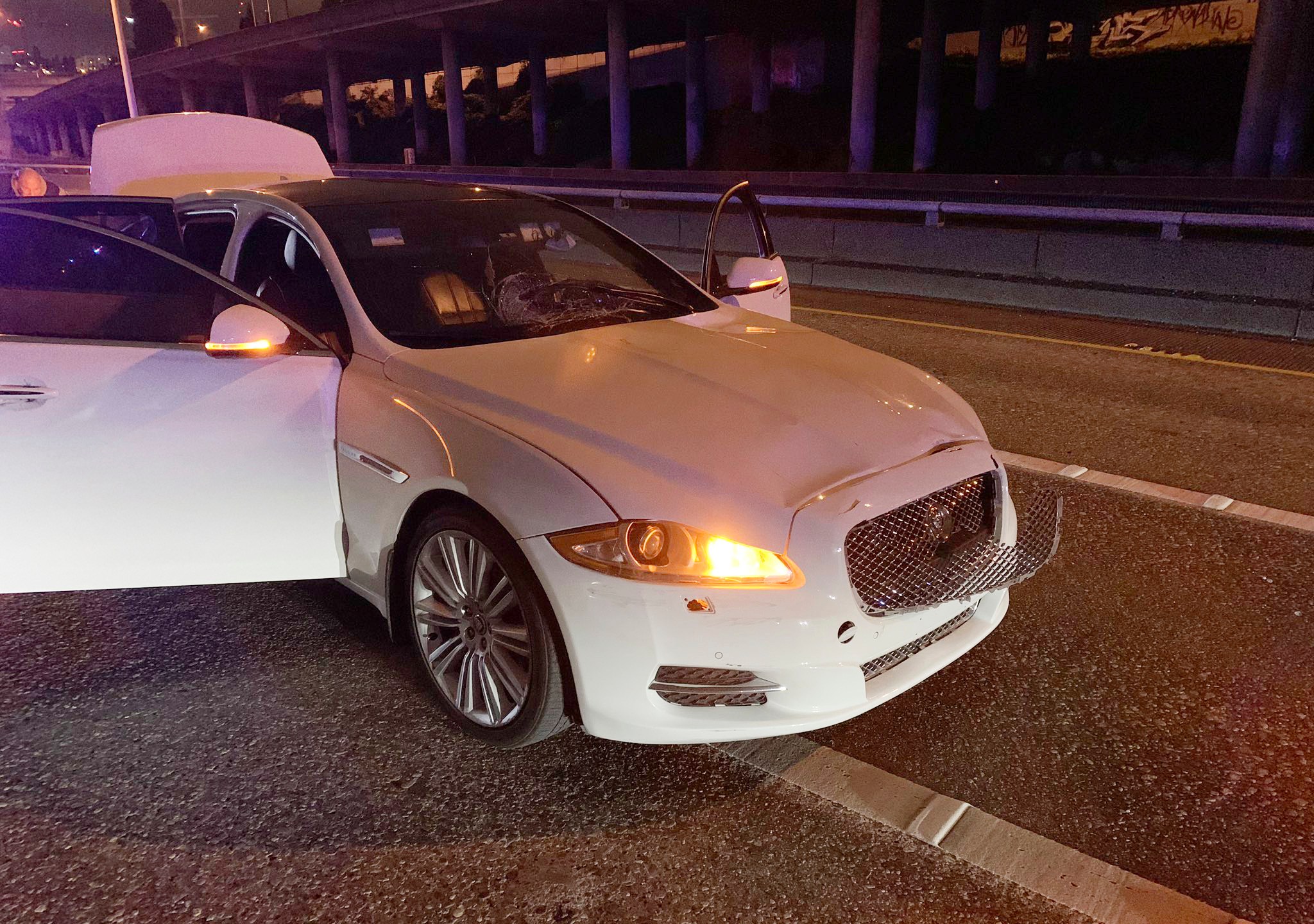 This early Saturday, July 4, 2020 photo provided by the Washington State Patrol shows the vehicle of Dawit Kelete who is suspected of driving into a protest on Interstate 5 in Seattle. (Washington State Patrol via AP)