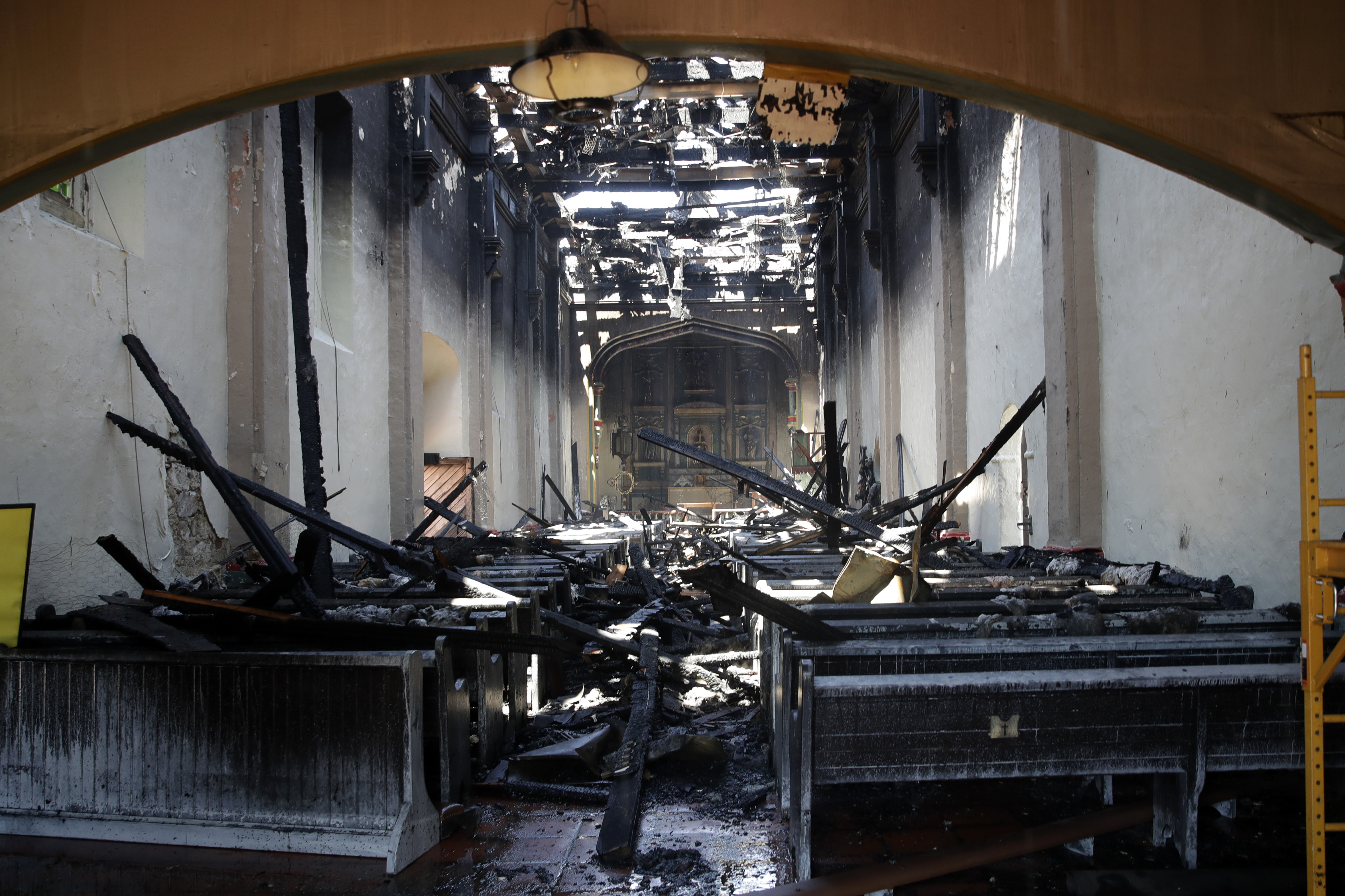 The interior of the San Gabriel Mission is damaged following a morning fire, Saturday, July 11, 2020, in San Gabriel. (Marcio Jose Sanchez / Associated Press)