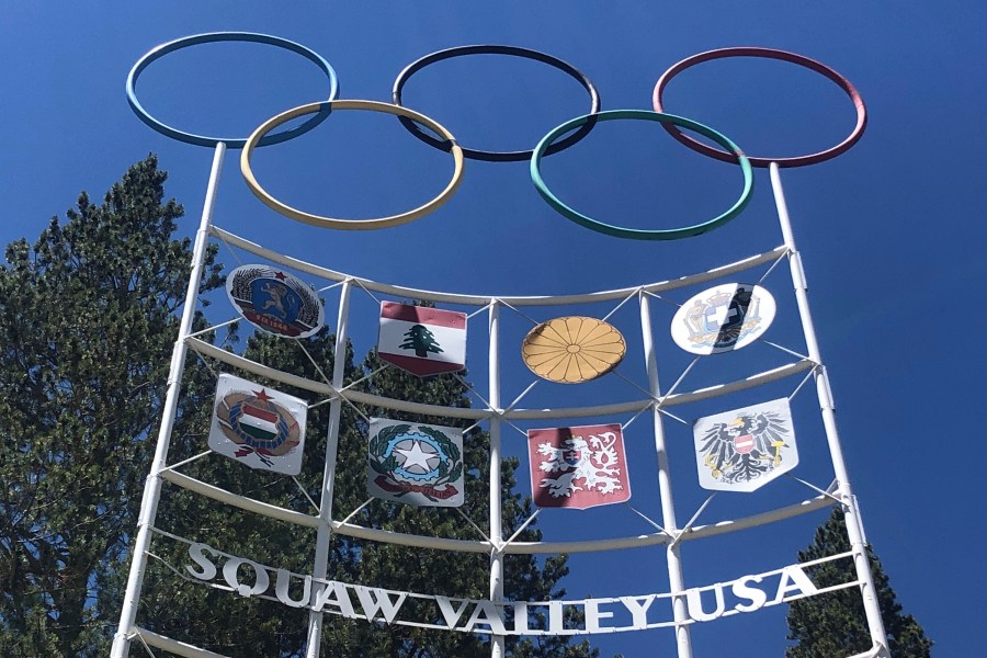 The Olympic rings stand atop a sign at the entrance to the Squaw Valley Ski Resort in Olympic Valley on July 8, 2020. (AP Photo/Haven Daley)