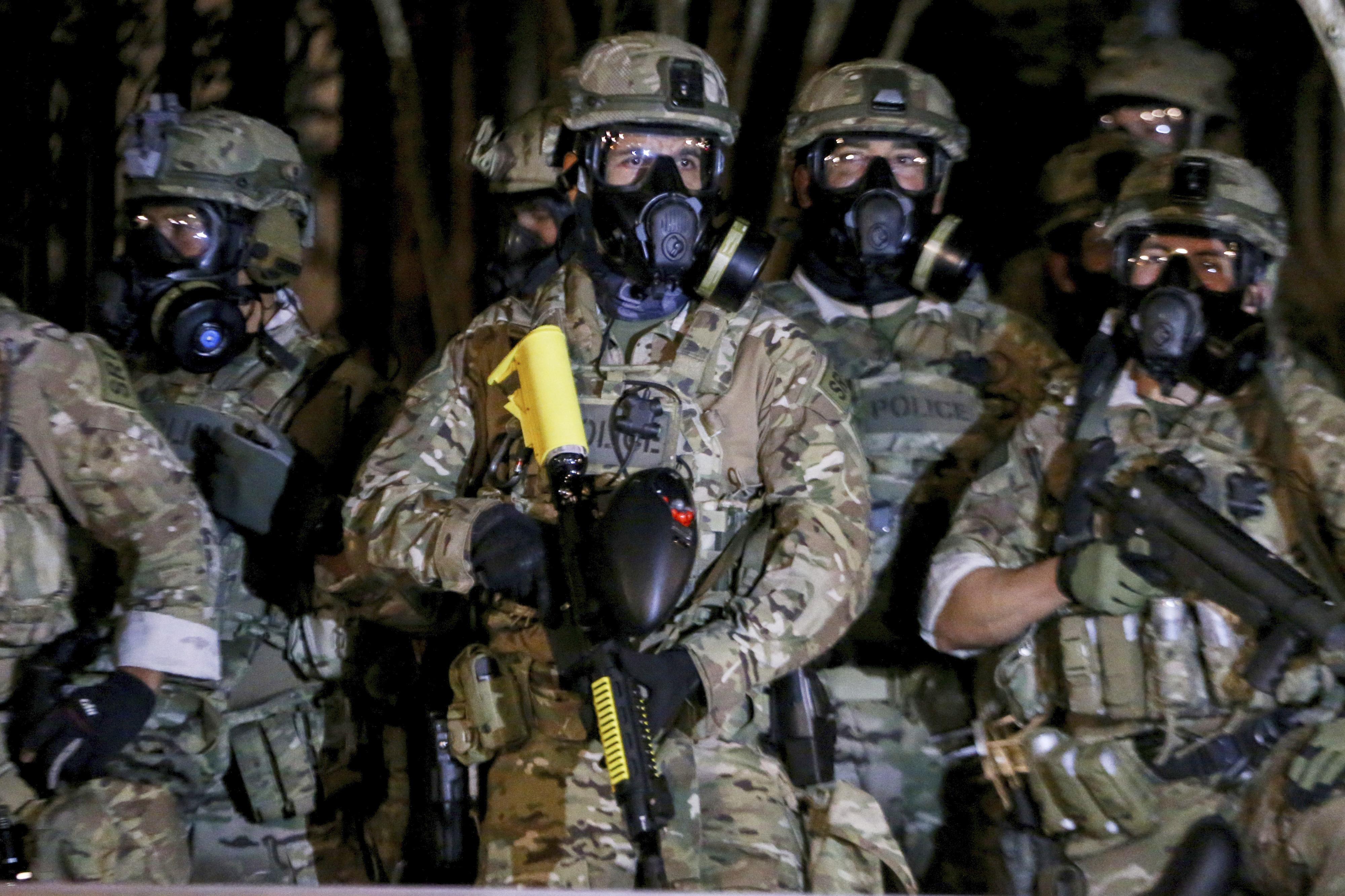 Officers prepare for a demonstration in Portland, Oregon on July 16, 2020. (Beth Nakamura/The Oregonian via AP)