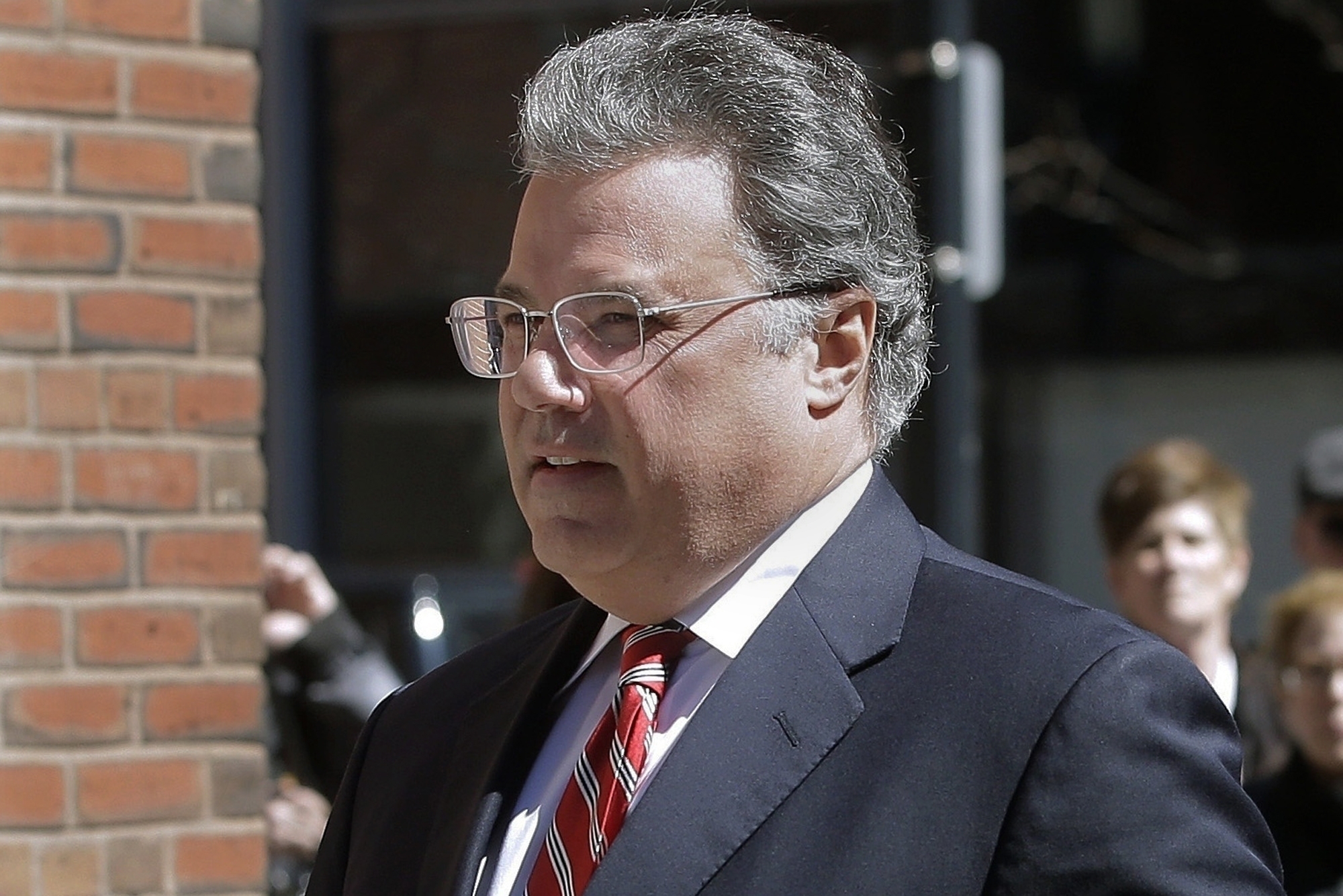 In this April 3, 2019 file photo, Manuel Henriquez arrives at federal court in Boston to face charges in a nationwide college admissions bribery scandal. (AP Photo/Steven Senne, File)