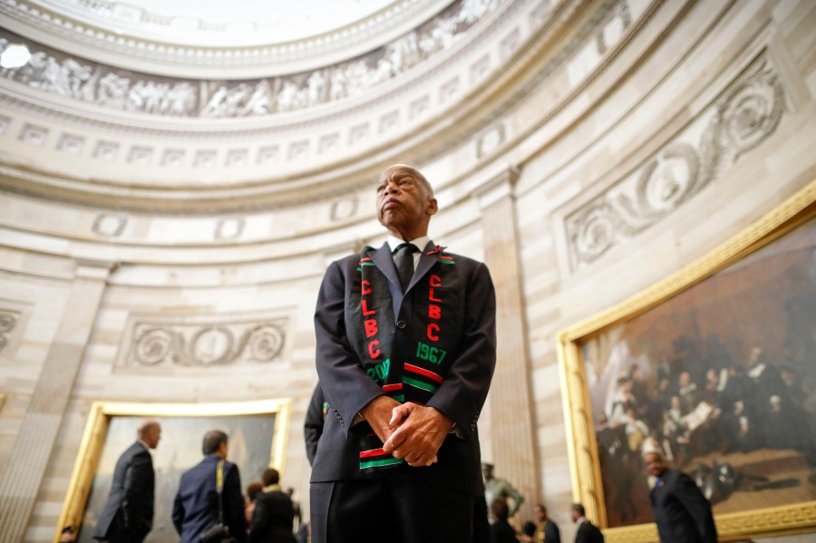 Rep. John Lewis waits with other members of the Congressional Black Caucus to enter the memorial service for Rep. Elijah Cummings at the U.S. Capitol on Oct. 24, 2019. (Pablo Martinez Monsivais / Getty Images)