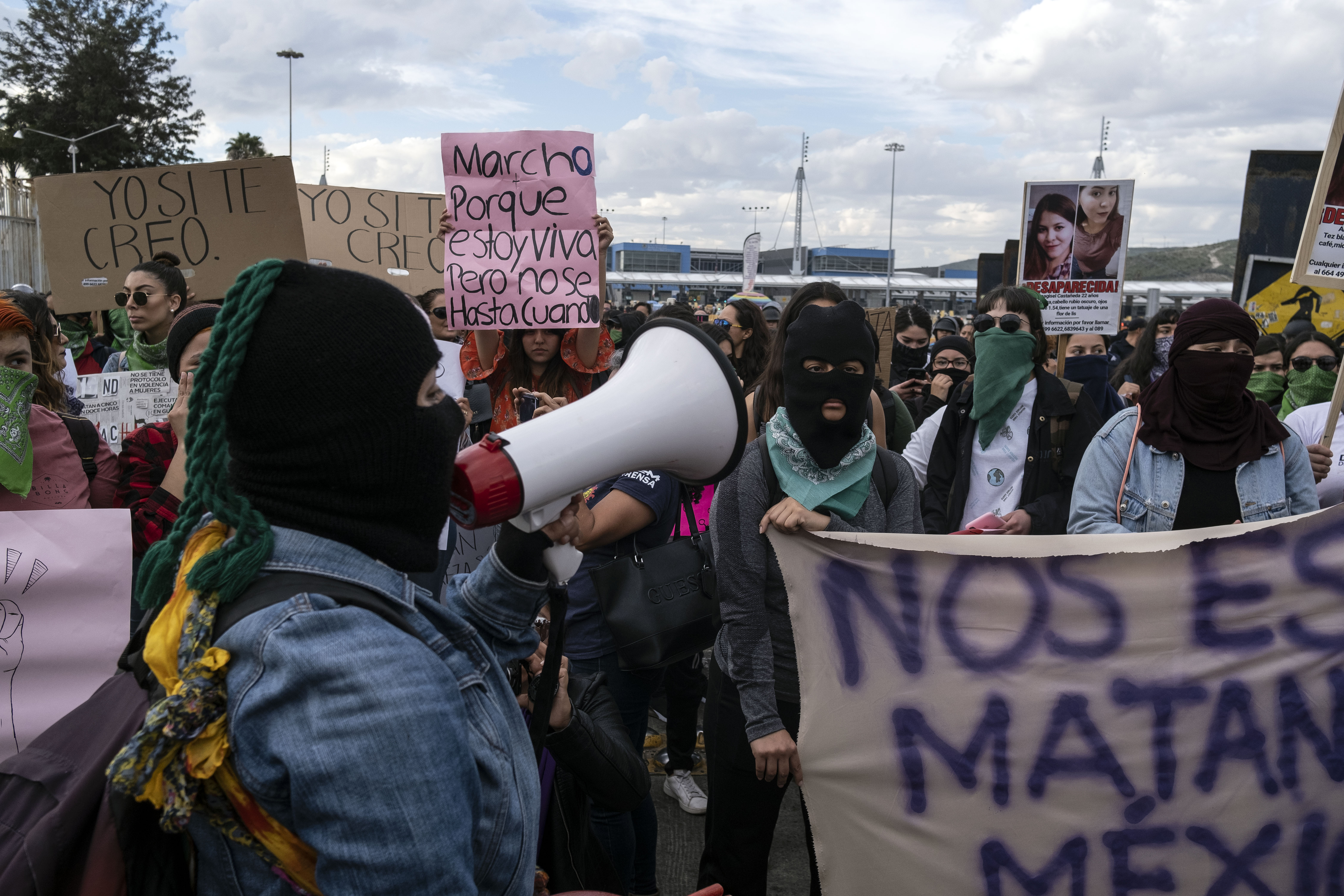 Women protest gender violence at the San Ysidro port of entry on the US/Mexico border on February 21, 2020, Tijuana, Baja California state, Mexico. Recent femicide cases in Mexico haveshocked the country, mobilizing women into to protesting gender violence. (GUILLERMO ARIAS/AFP via Getty Images)