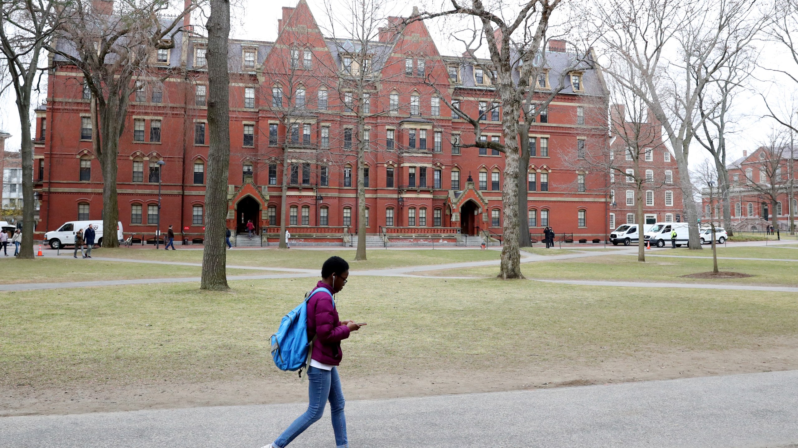 A student walks through Harvard Yard on the campus of Harvard University on March 12, 2020, in Cambridge, Massachusetts. (Maddie Meyer/Getty Images)