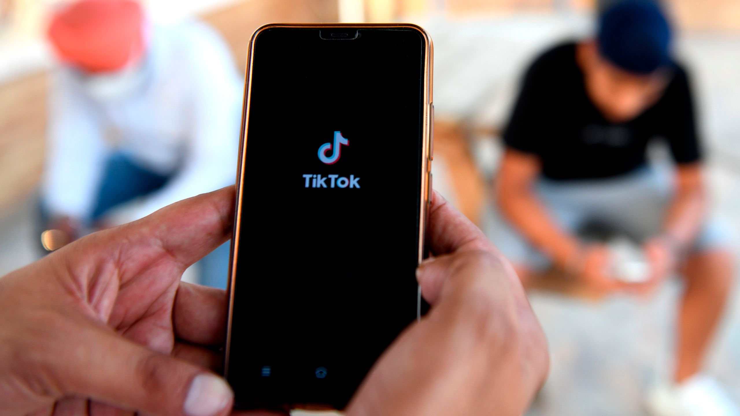 A person browses through the 'Tik Tok' app on a smartphones in Amritsar on June 30, 2020. (NARINDER NANU/AFP via Getty Images)