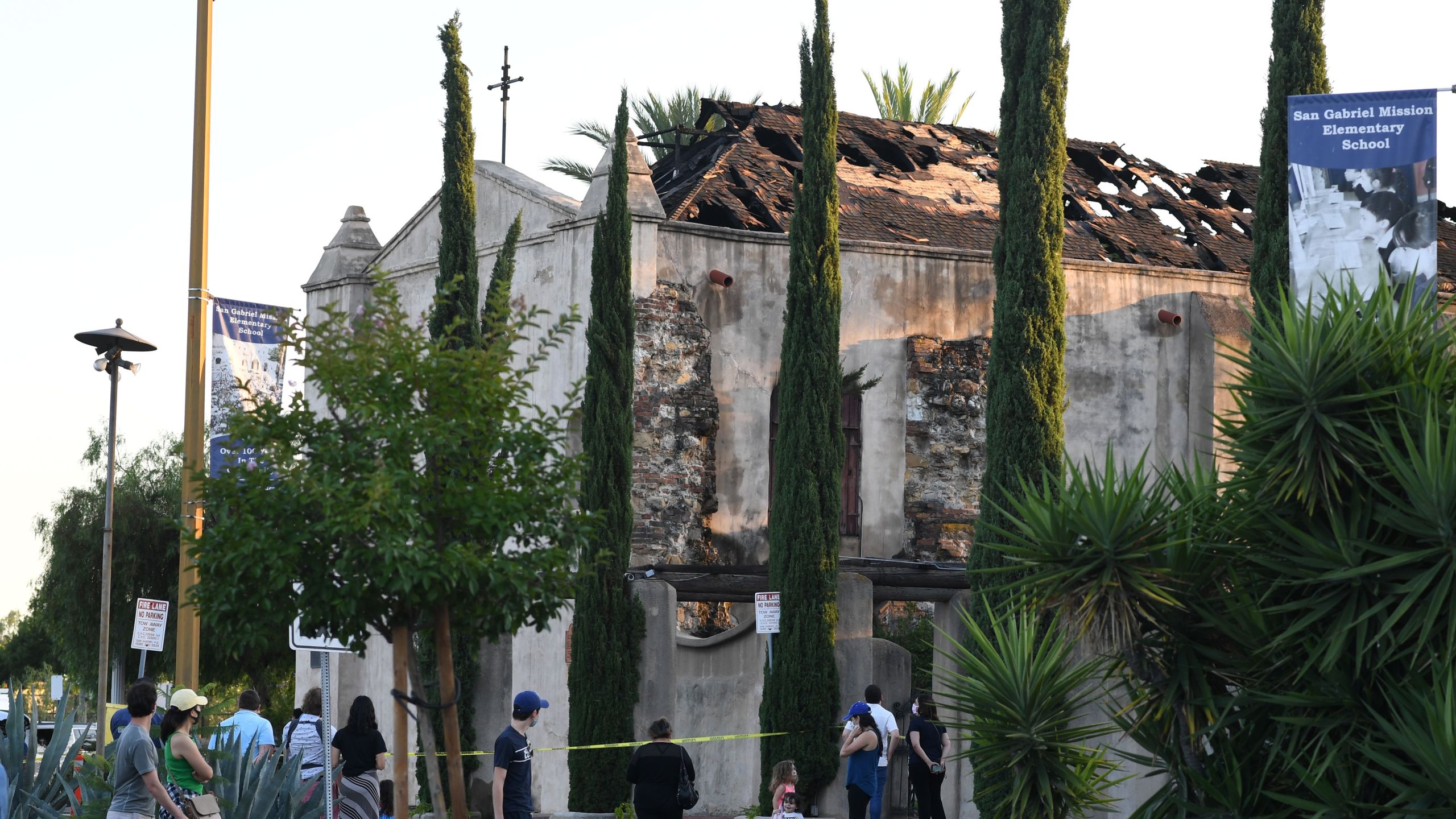 The damaged roof of the San Gabriel Mission is seen after a fire broke out early on July 11, 2020, in San Gabriel. (ROBYN BECK/AFP via Getty Images)