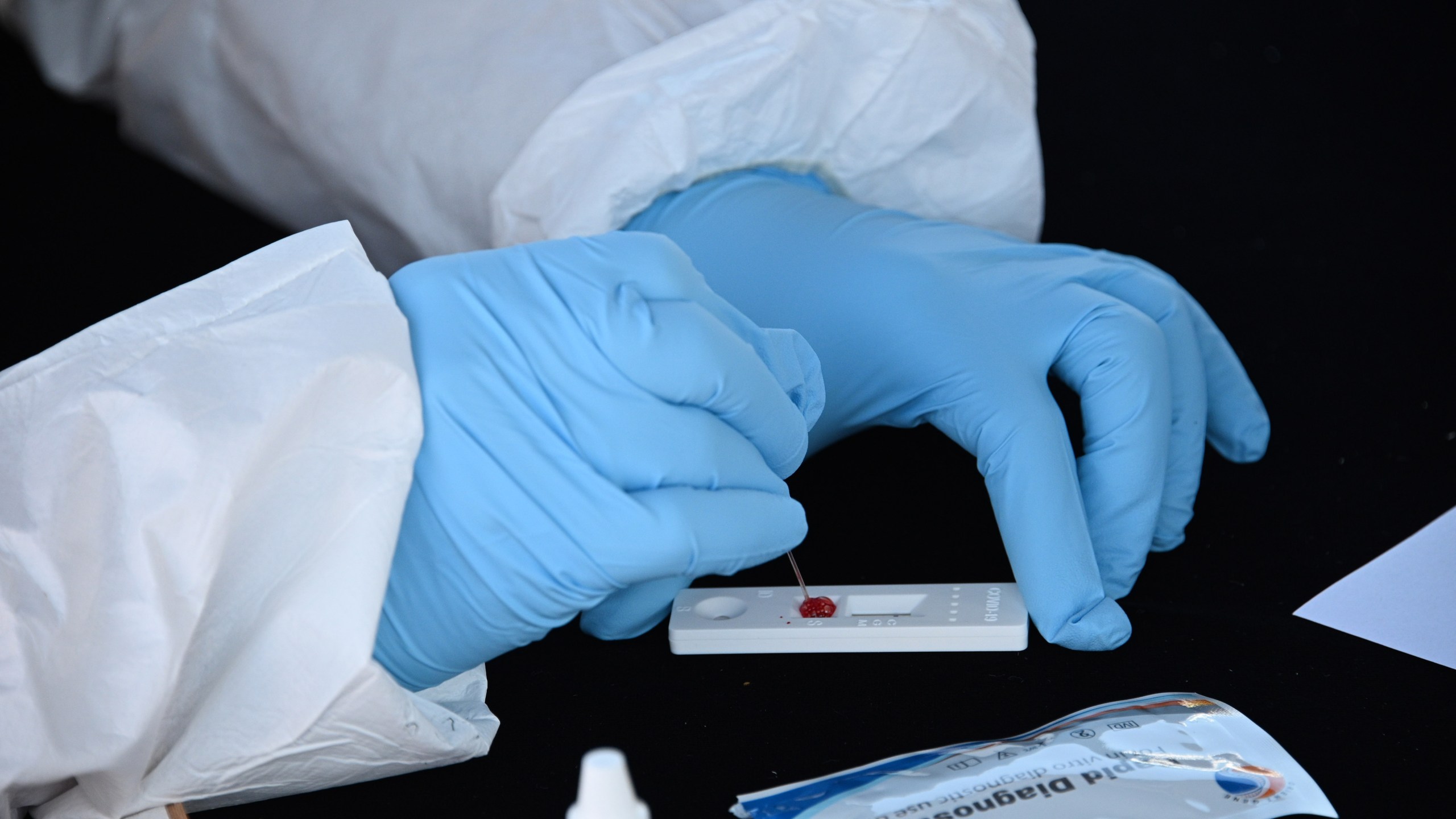 A blood sample is processed at a rapid serological testing site in San Dimas on July 26, 2020. (Robyn Beck / AFP / Getty Images)