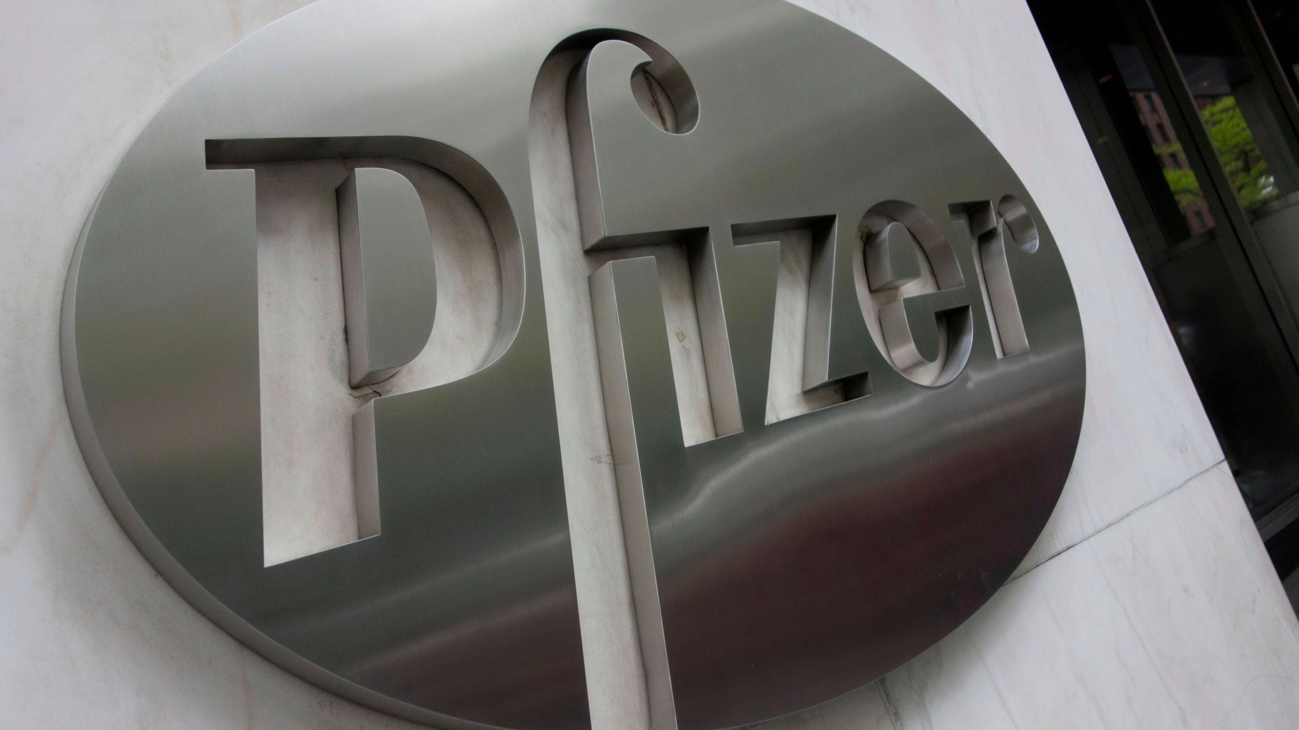 The Pfizer company logo is seen in a file photo. (DON EMMERT/AFP via Getty Images)