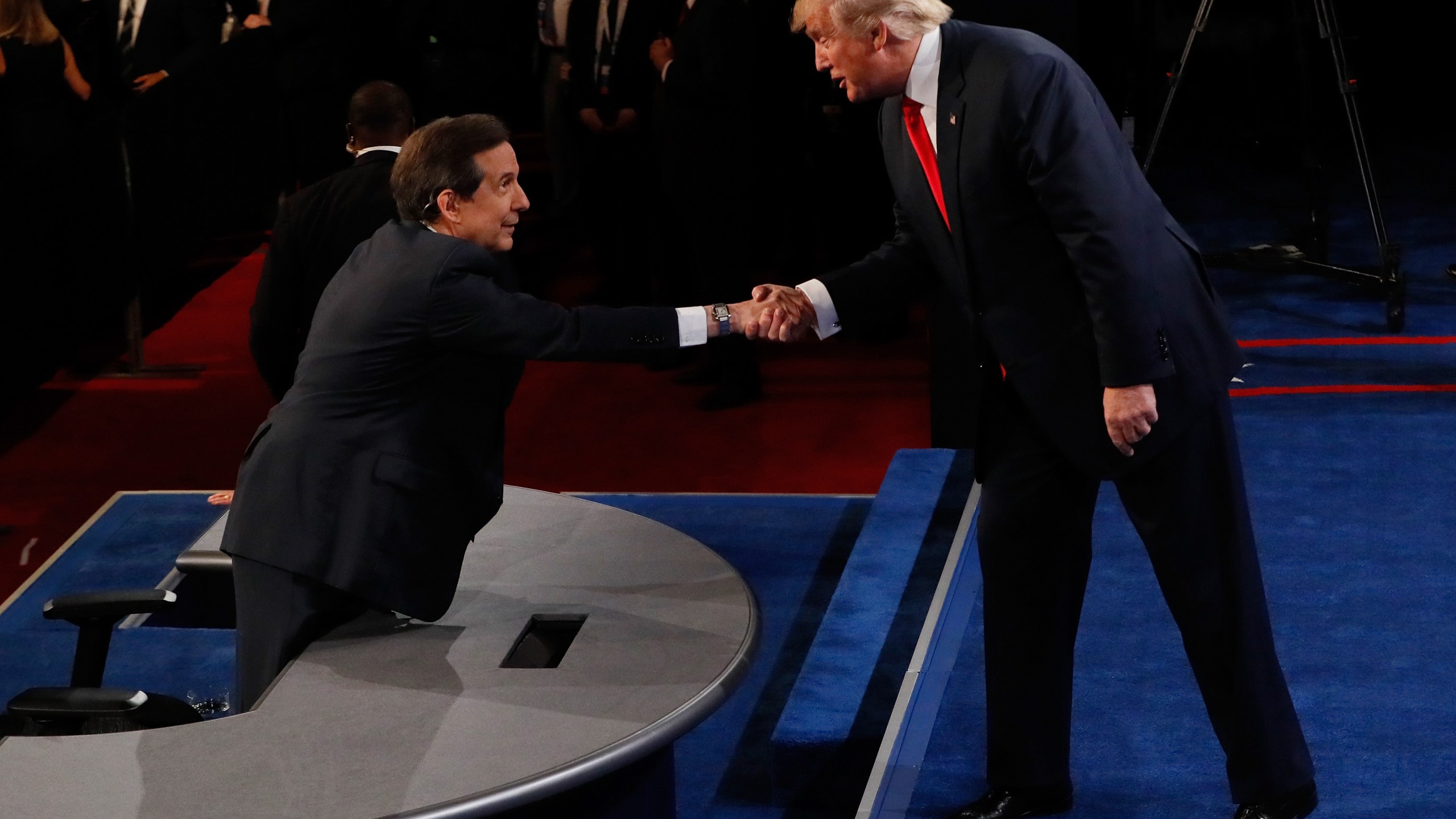 Republican presidential nominee Donald Trump shakes hands with Fox News anchor and moderator Chris Wallace after the third U.S. presidential debate at the Thomas & Mack Center on Oct. 19, 2016, in Las Vegas, Nevada. (Mark Ralston-Pool/Getty Images)