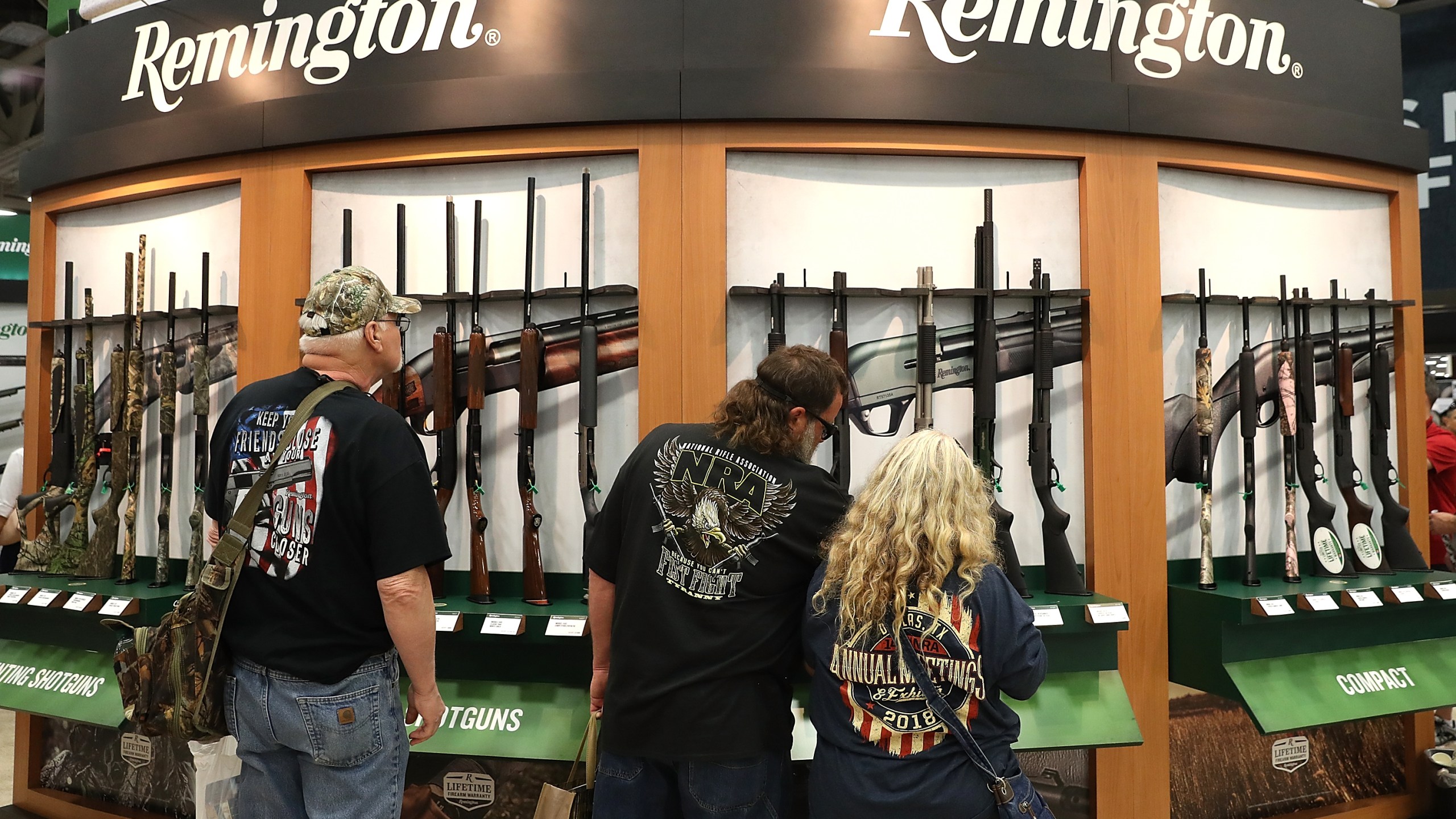 Attendees look at a display of Remington shotguns during the NRA Annual Meeting & Exhibits at the Kay Bailey Hutchison Convention Center on May 5, 2018 in Dallas, Texas. (Justin Sullivan/Getty Images)