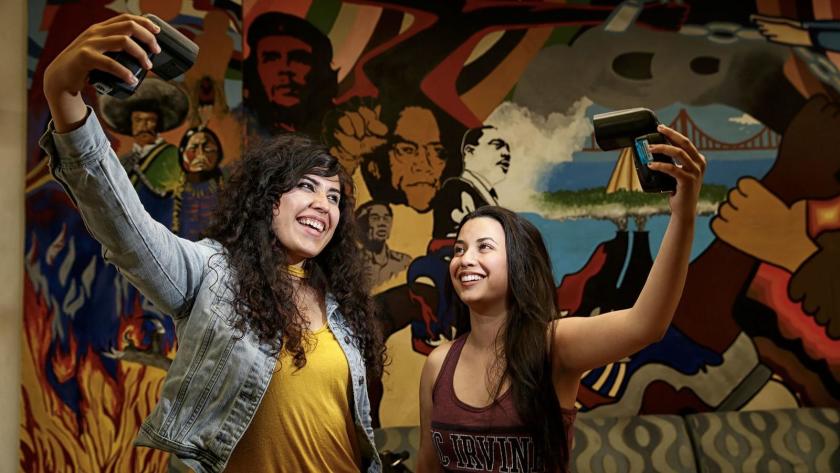 UC Irvine students Angela Vera, left, and Daniela Estrada are part of the growing Latino student population at the University of California.(Robert Gauthier / Los Angeles Times)