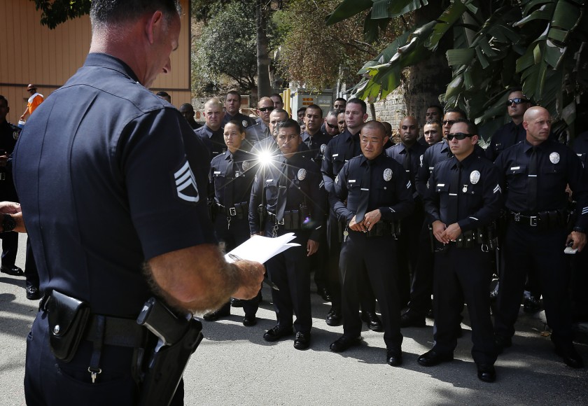 A sergeant speaks to a platoon of LAPD Metropolitan Division officers deployed in 2015 as part of an effort to reduce crime.(Barbara Davidson / Los Angeles Times)