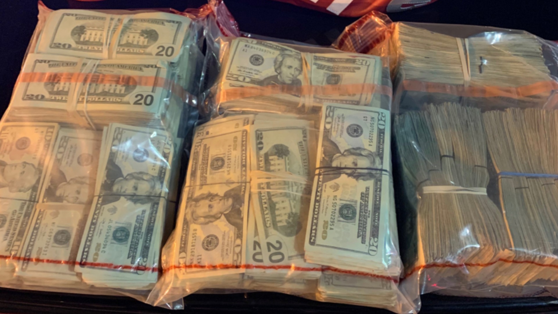 The California Department of Justice released photo of cash seized during recent drug trafficking operations.