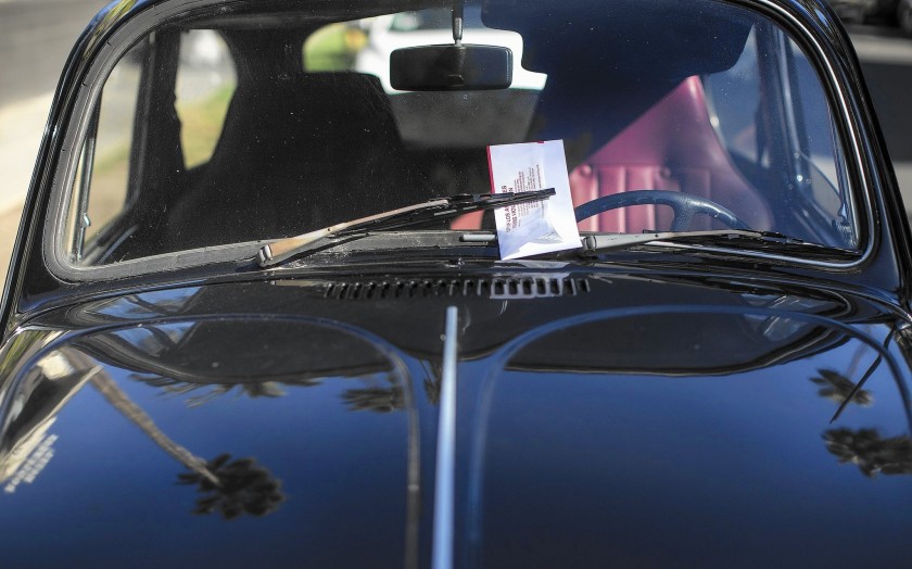 A parking ticket sits on a vintage Volkswagen in this undated file photo. (Gina Ferazzi / Los Angeles Times)