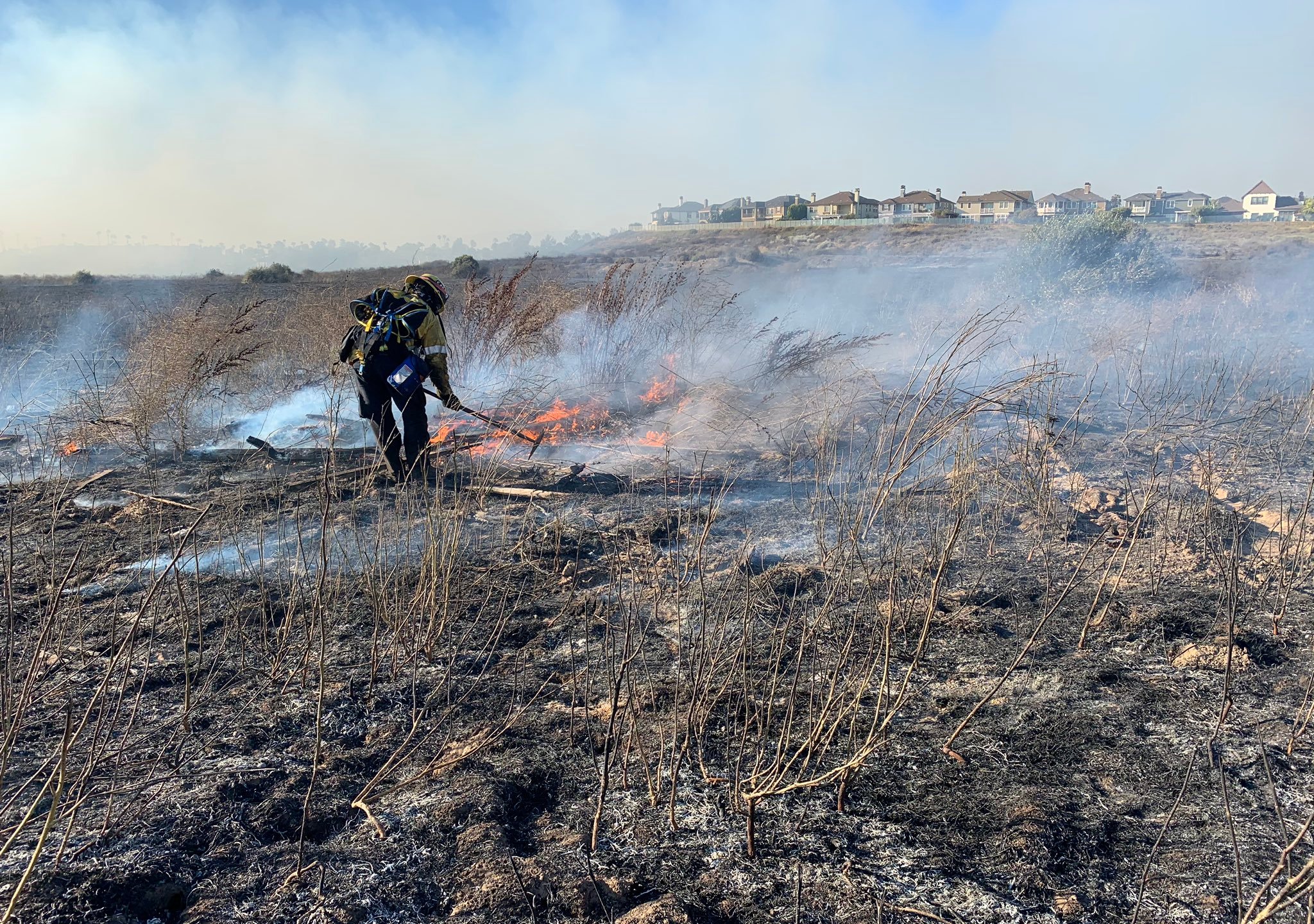 A brush fire burned more than 60 acres in Huntington Beach on July 26, 2020. (KTLA)