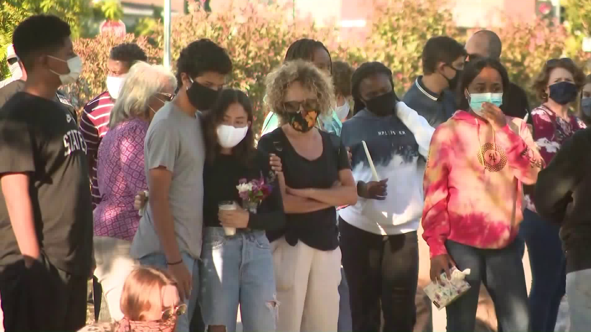 Community members mourn shooting victim Jakeil Reynolds at a vigil in Ladera Heights on July 24, 2020. (KTLA)