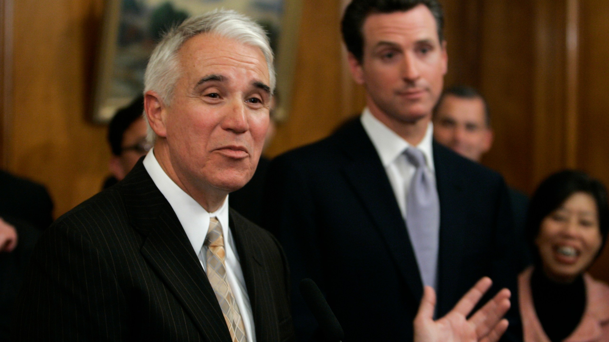 In this file photo San Francisco's new police chief George Gason, left, and Mayor Gavin Newsom, right, are seen during an introduction and news conference at City Hall in San Francisco on June 17, 2009. (Eric Risberg/Associated Press)