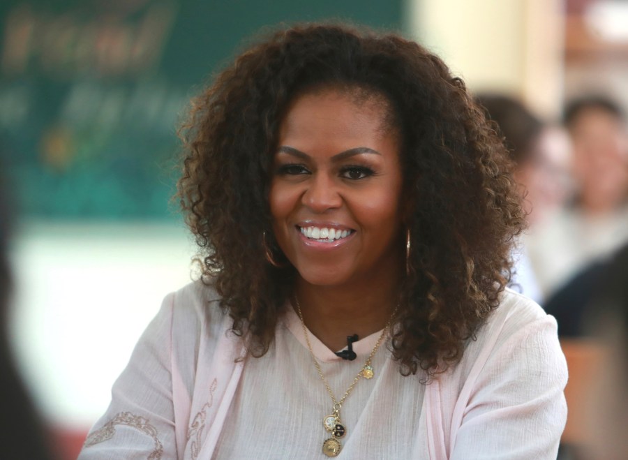 In this Dec. 9, 2019, file photo, Michelle Obama listens to female students at the Can Giuoc high school in Long An province, Vietnam. (AP Photo/Hau Dinh)