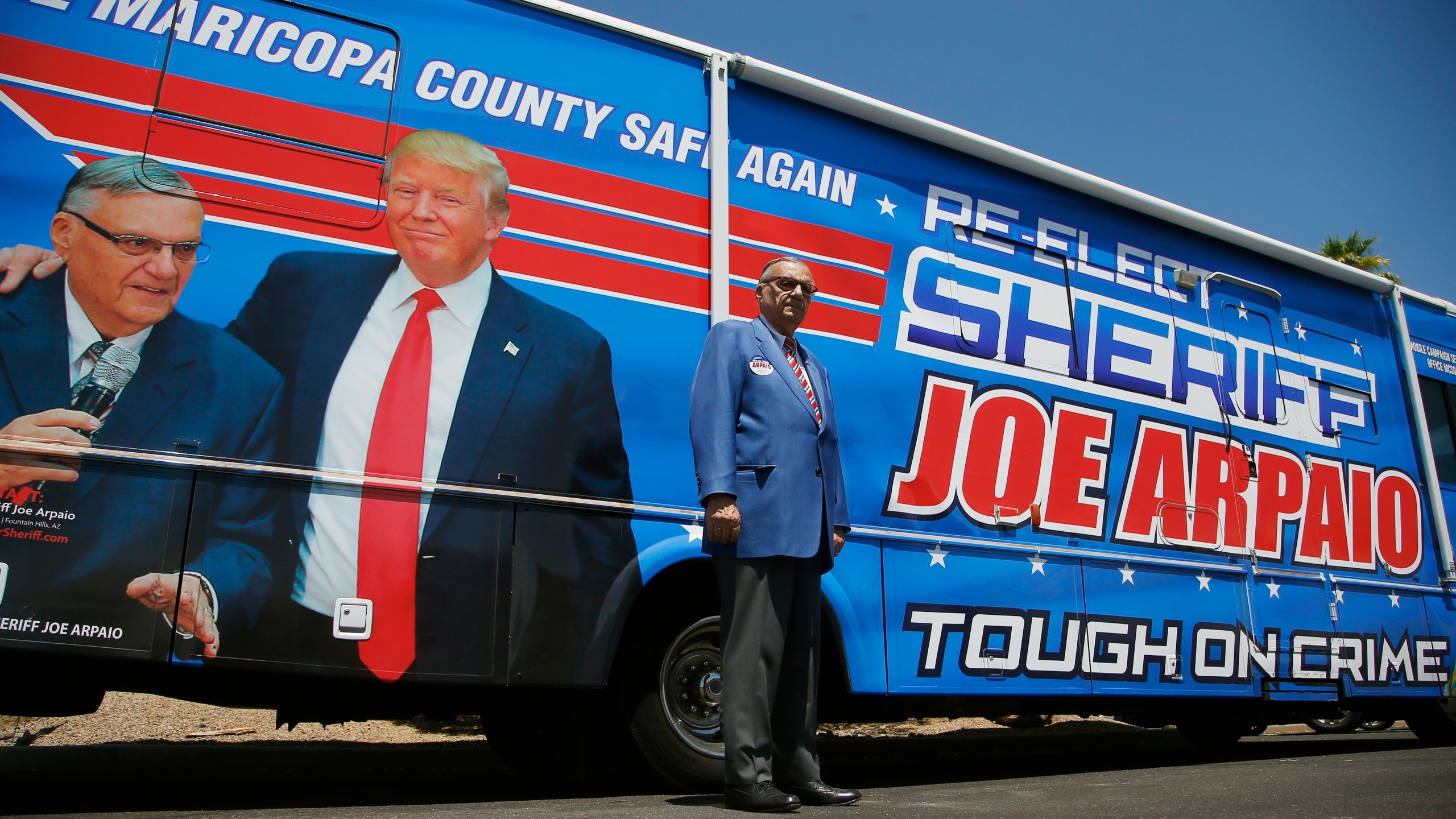 Former Maricopa County Sheriff Joe Arpaio, poses for a photograph in front of his campaign vehicle as he ran for his former position of Maricopa County Sheriff again on July 22, 2020. (Ross D. Franklin/Associated Press)