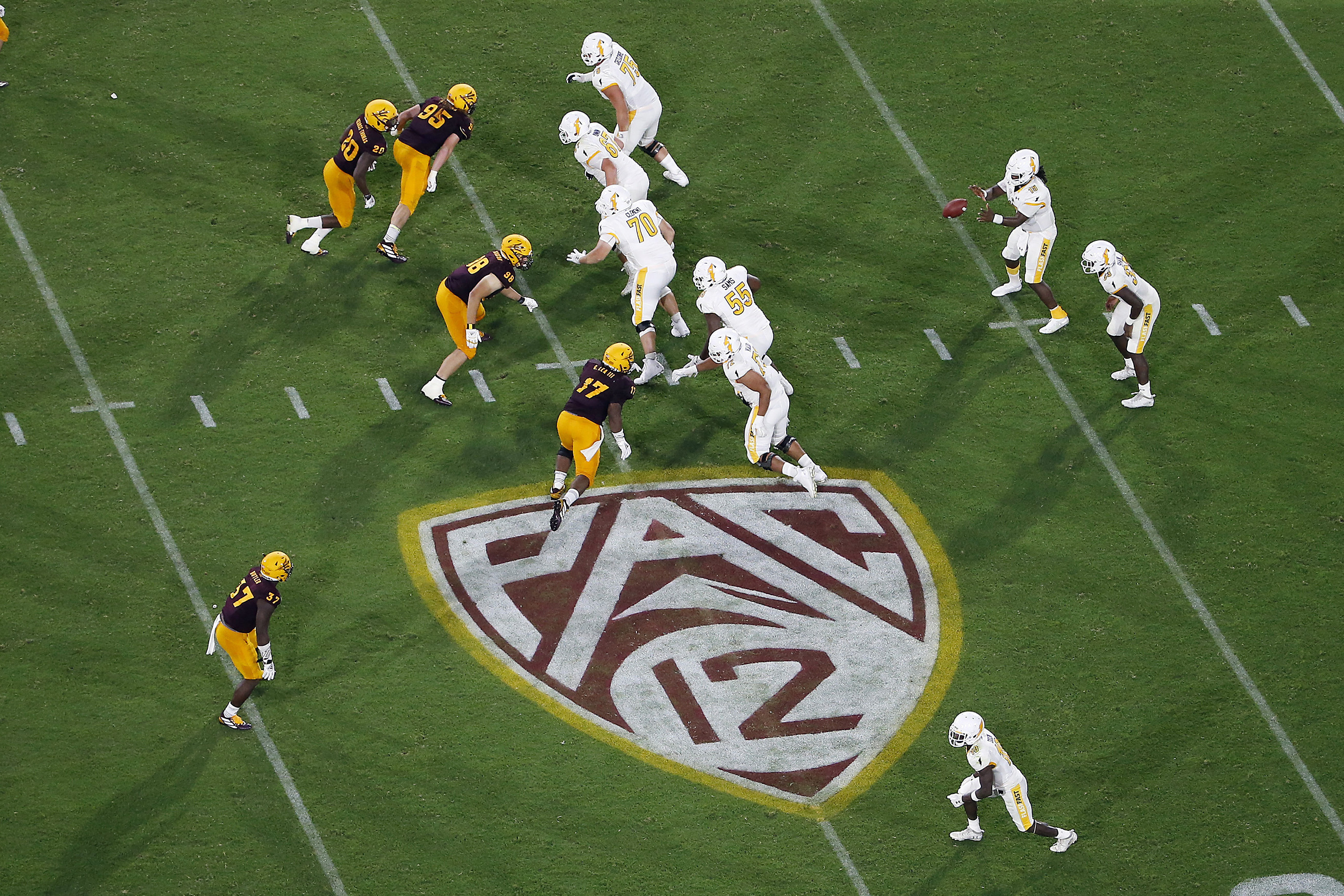 This Thursday, Aug. 29, 2019, file photo, shows the Pac-12 logo during the second half of an NCAA college football game between Arizona State and Kent State, in Tempe, Arizona. (AP Photo/Ralph Freso, File)