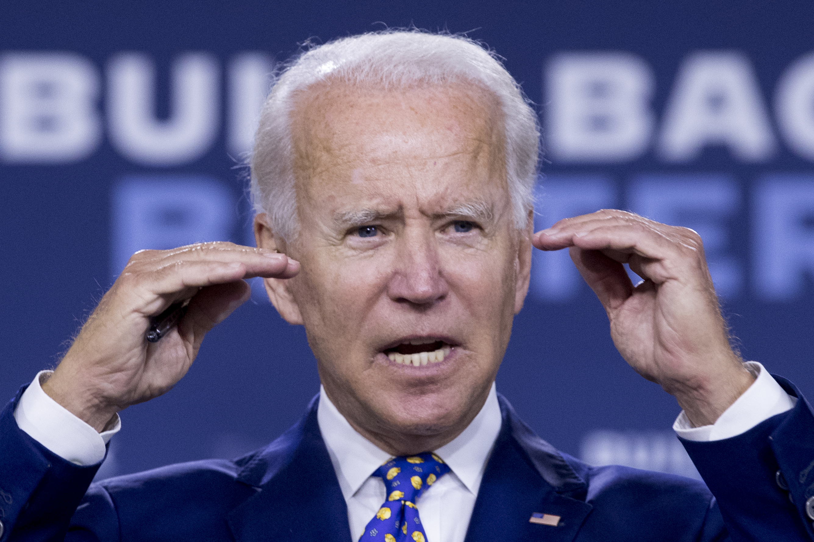 In this July 28, 2020 file photo, Democratic presidential candidate former Vice President Joe Biden speaks at a campaign event at the William "Hicks" Anderson Community Center in Wilmington, Del. Biden will not travel to Milwaukee to accept Democratic presidential nomination. (AP Photo/Andrew Harnik)