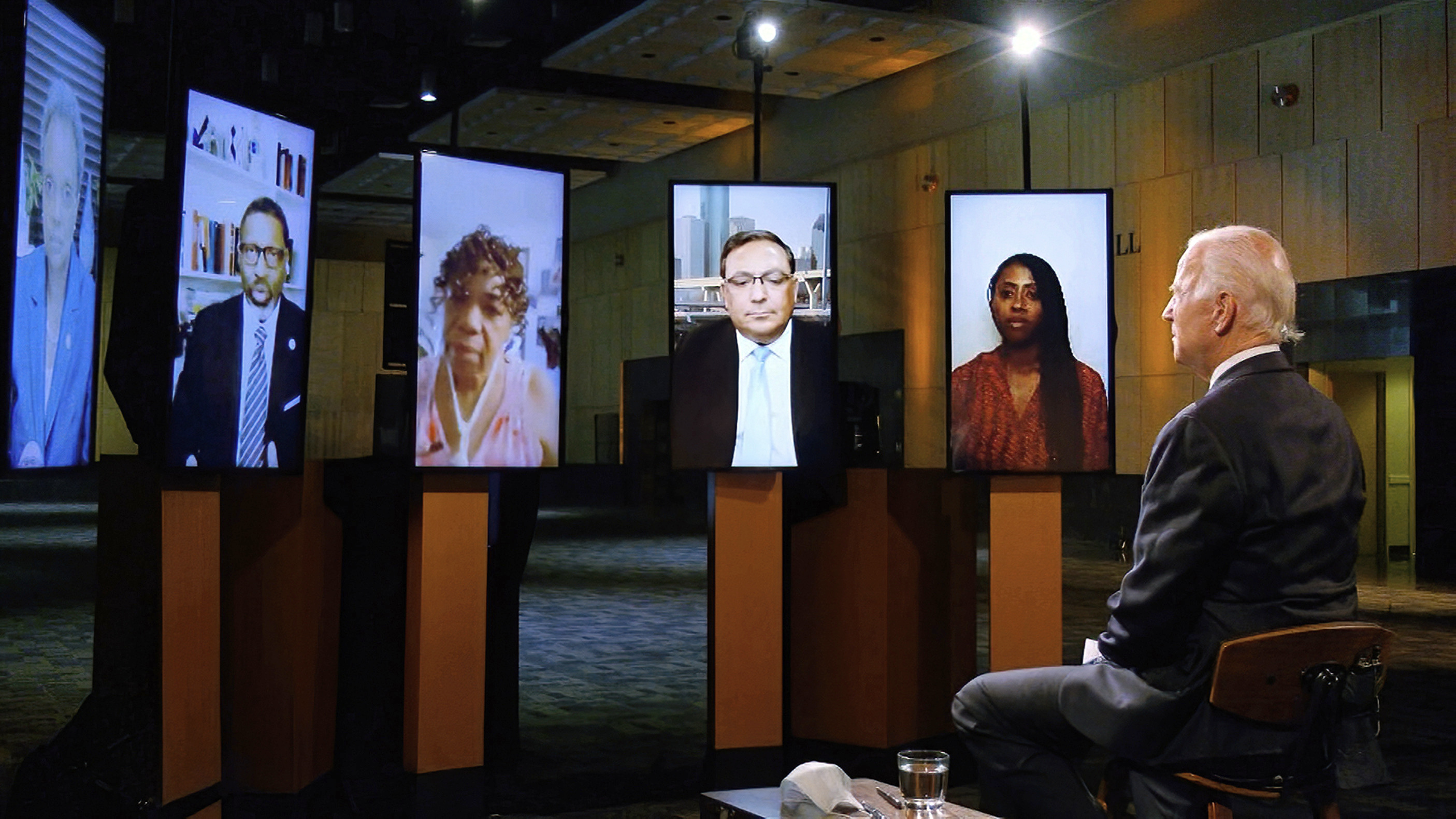 In this image from video, Democratic presidential candidate former Vice President Joe Biden leads a conversation on racial justice with Art Acevedo, Jamira Burley, Gwen Carr, Derrick Johnson and Lori Lightfoot during the first night of the Democratic National Convention on Aug. 17, 2020. (Democratic National Convention via Associated Press)