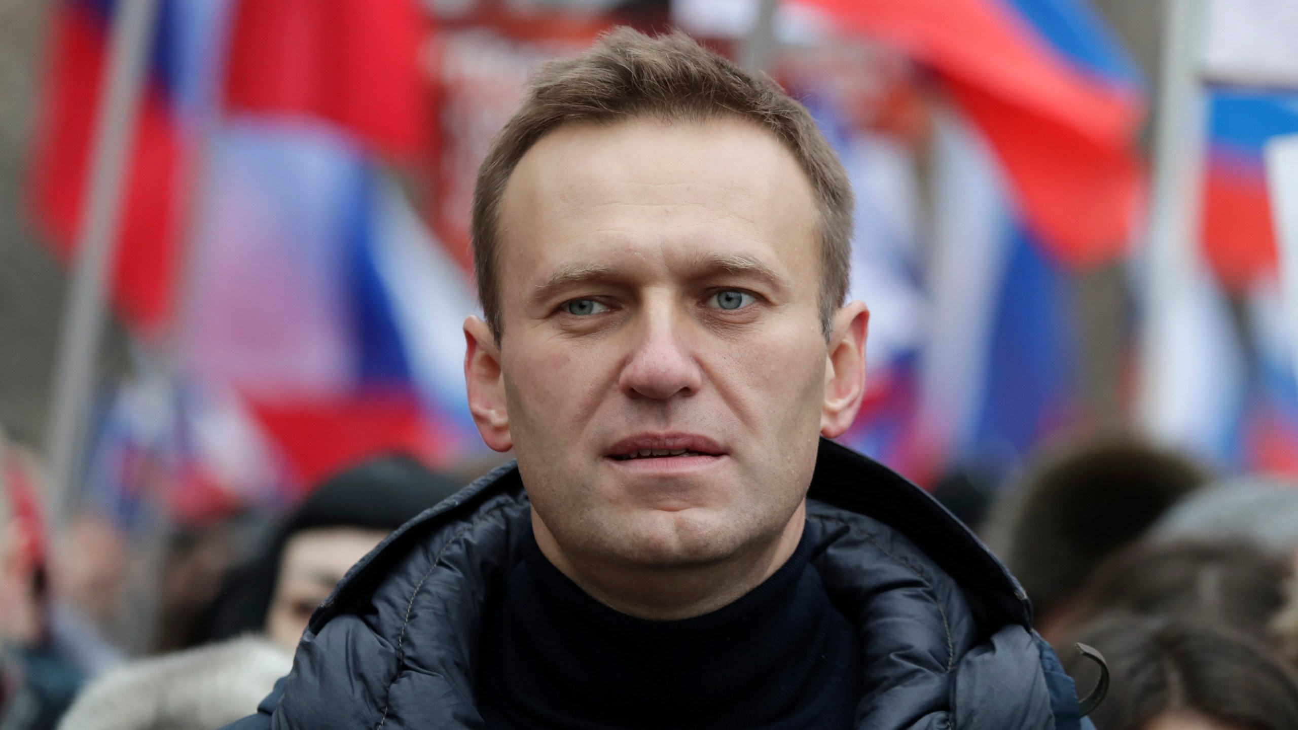 In this Sunday, Feb. 24, 2019 file photo, Russian opposition activist Alexei Navalny takes part in a march in memory of opposition leader Boris Nemtsov in Moscow, Russia. (AP Photo/Pavel Golovkin, File)