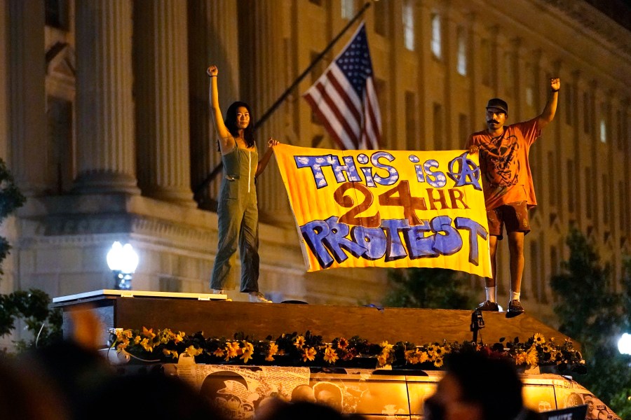 Protestors rally on Aug. 27, 2020, in Washington, D.C. President Donald Trump is set to deliver his acceptance speech later Thursday night from the nearby White House South Lawn. (AP Photo/Carolyn Kaster)