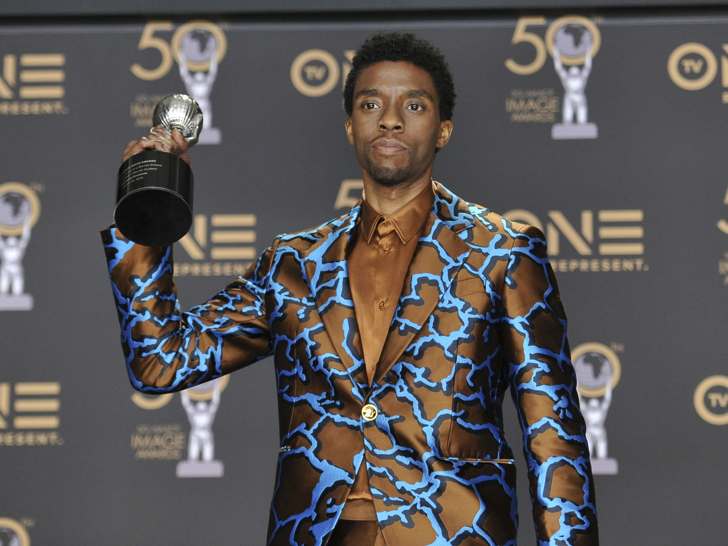 Chadwick Boseman poses in the press room with the award for outstanding actor in a motion picture for "Black Panther" at the 50th annual NAACP Image Awards at the Dolby Theatre in Los Angeles on March 30, 2019. (Richard Shotwell/Invision/AP, File)