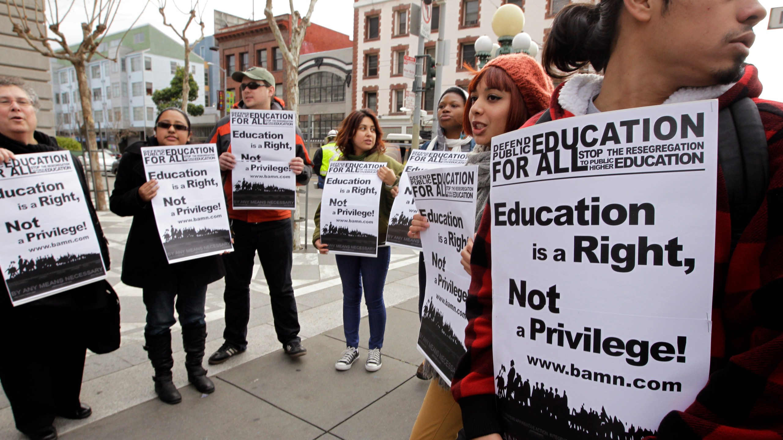 In this Feb. 13, 2012, file photo, demonstrators protest outside the U.S. 9th Circuit Court of Appeals after a panel heard oral arguments in San Francisco in a lawsuit seeking to overturn Proposition 209, which barred racial, ethnic or gender preferences in public education, employment and contracting. (AP Photo/Paul Sakuma, File)