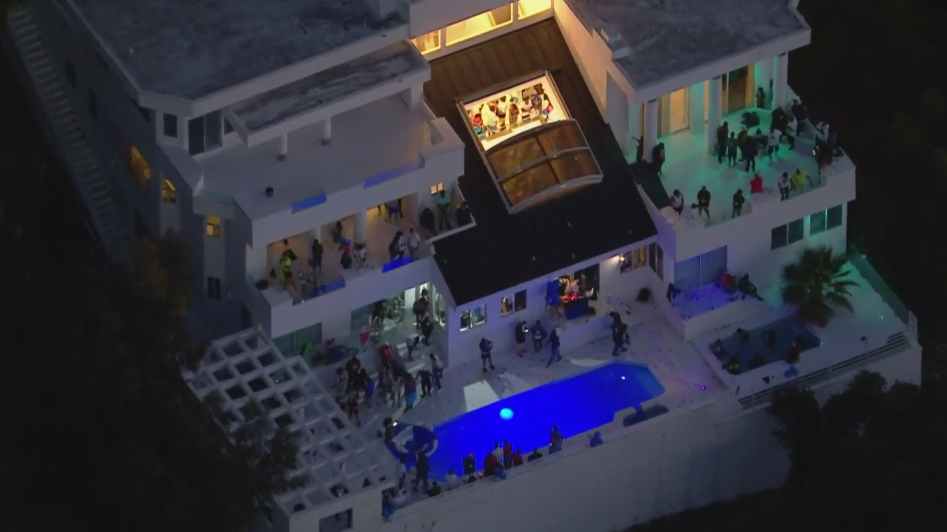 People party at a mansion in Beverly Crest before police responded to a shooting there on Aug. 4, 2020. (KTLA)