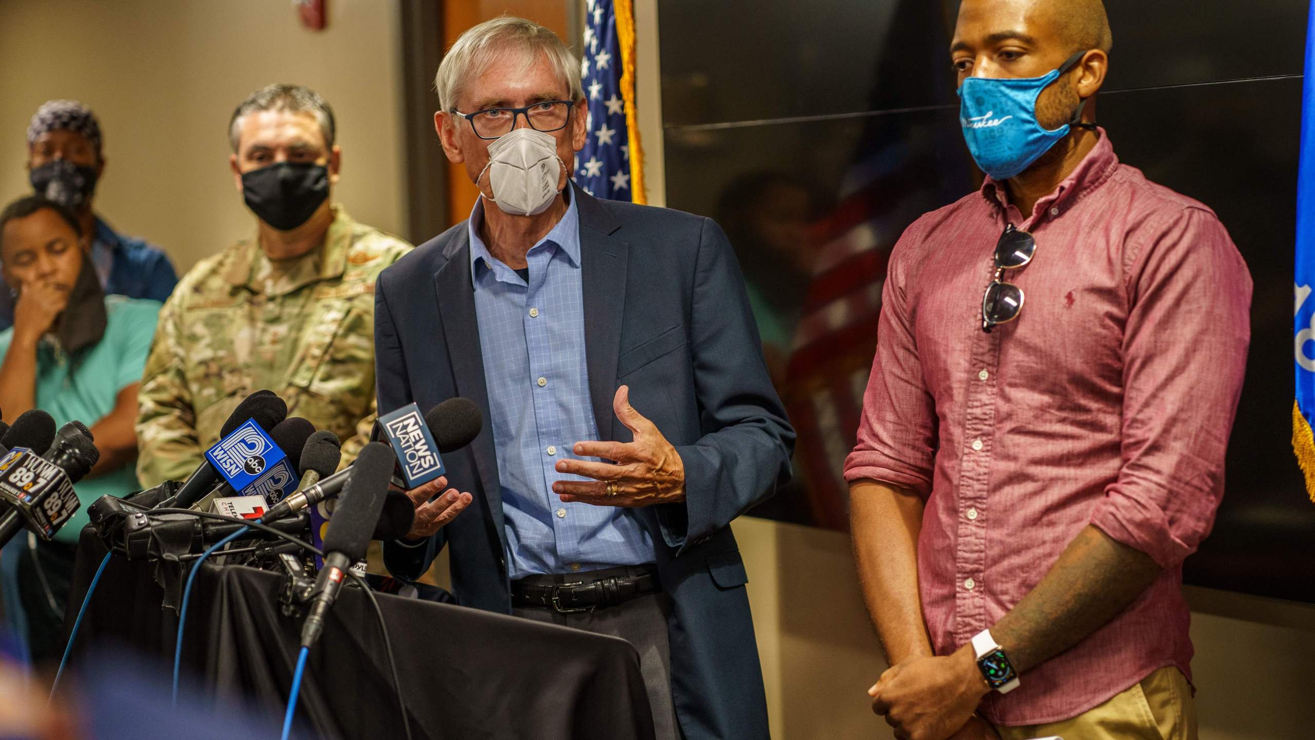 Wisconsin Governor Tony Evers (C) speaks, Lieutenant Governor Mandela Barnes (R) and Major General Paul Knapp (L) at a news conference, on Aug. 27, 2020 in Kenosha, Wisconsin. (KEREM YUCEL/AFP via Getty Images)