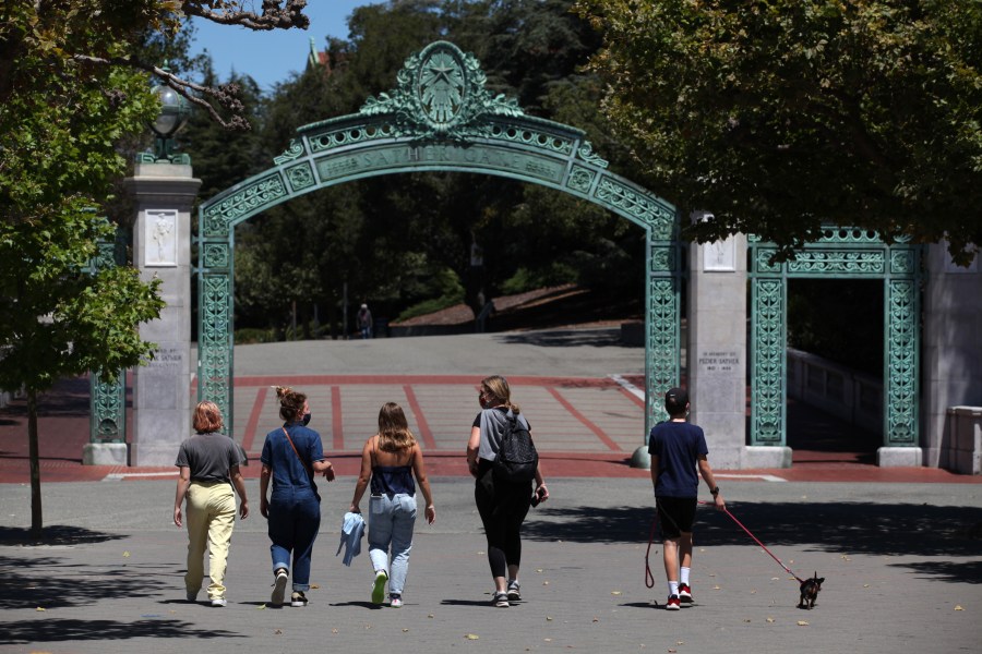 People walk towards Sather Gate on the UC Berkeley campus on July 22, 2020. (Justin Sullivan / Getty Images)