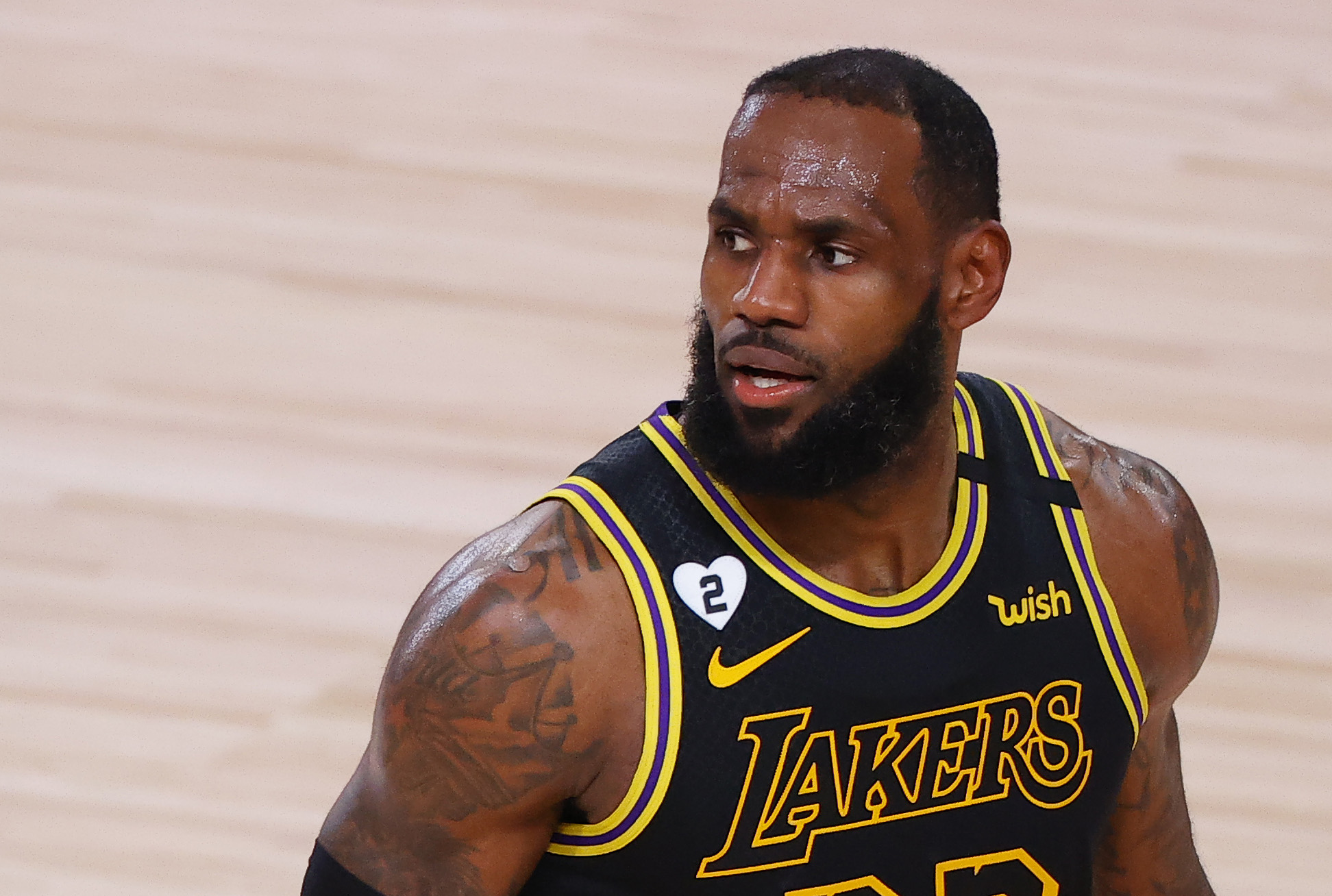 LeBron James of the Los Angeles Lakers reacts against the Portland Trail Blazers during the third quarter in Game Four of the Western Conference First Round during the 2020 NBA Playoffs at AdventHealth Arena at ESPN Wide World Of Sports Complex on Aug. 24, 2020 in Lake Buena Vista, Florida. (Kevin C. Cox/Getty Images)