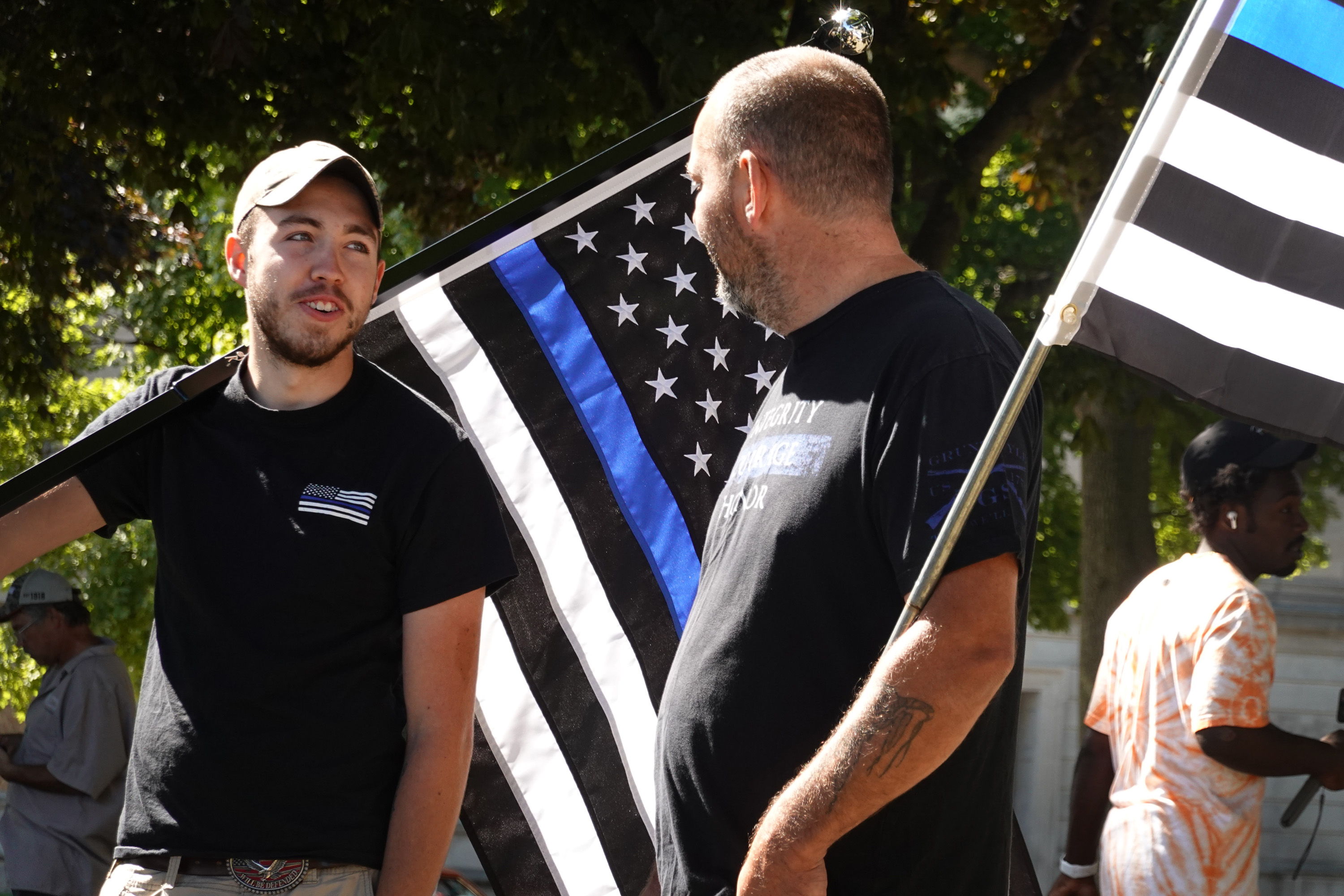 Demonstrators hold a Back the Blue Rally in front of the Kenosha County Courthouse on Aug. 30, 2020, in Kenosha, Wisconsin. The city is recovering from several days of unrest and demonstrations after Jacob Blake was shot several times at close range in the back during an encounter with a police officer, which was caught on video. (Scott Olson/Getty Images)