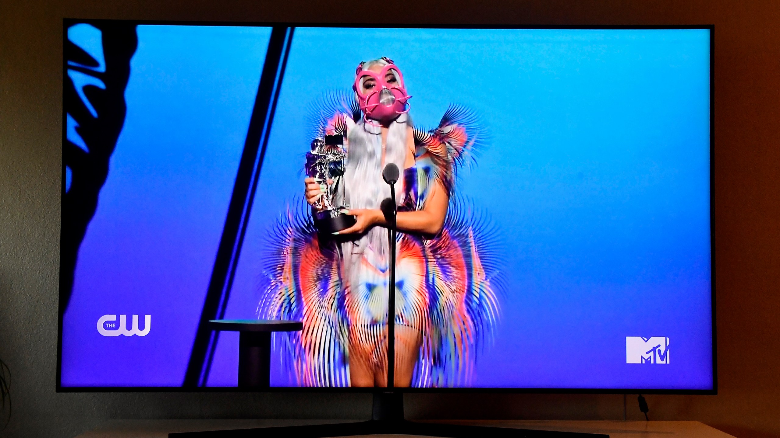 In this photo illustration, Lady Gaga accepts the Best Collaboration award for "Rain on Me" with Ariana Grande, viewed on a television screen, during the 2020 MTV Video Music Awards broadcast on Aug. 30, 2020 in New York City. (Frazer Harrison/Getty Images)