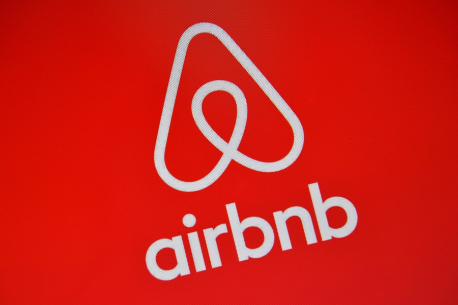 The Airbnb logo is displayed on a computer screen in London on Aug. 3, 2016. (Carl Court / Getty Images)