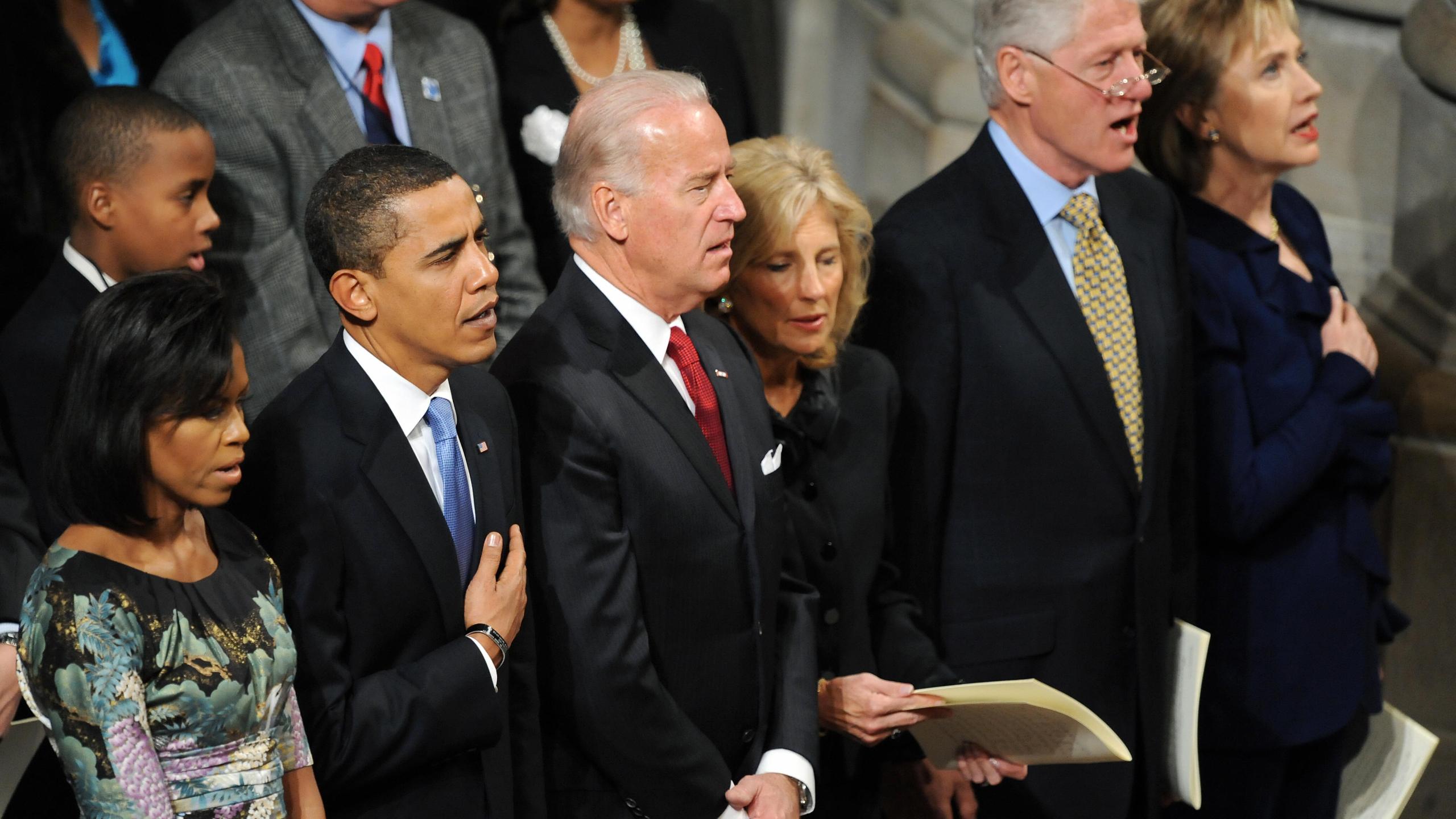 Barack and Michella Obama, Joe and Jill Biden, and Bill and Hillary Rodham Clinton attend the National Prayer Service in Washington, D.C., on Jan. 21, 2009. (JEWEL SAMAD/AFP via Getty Images)