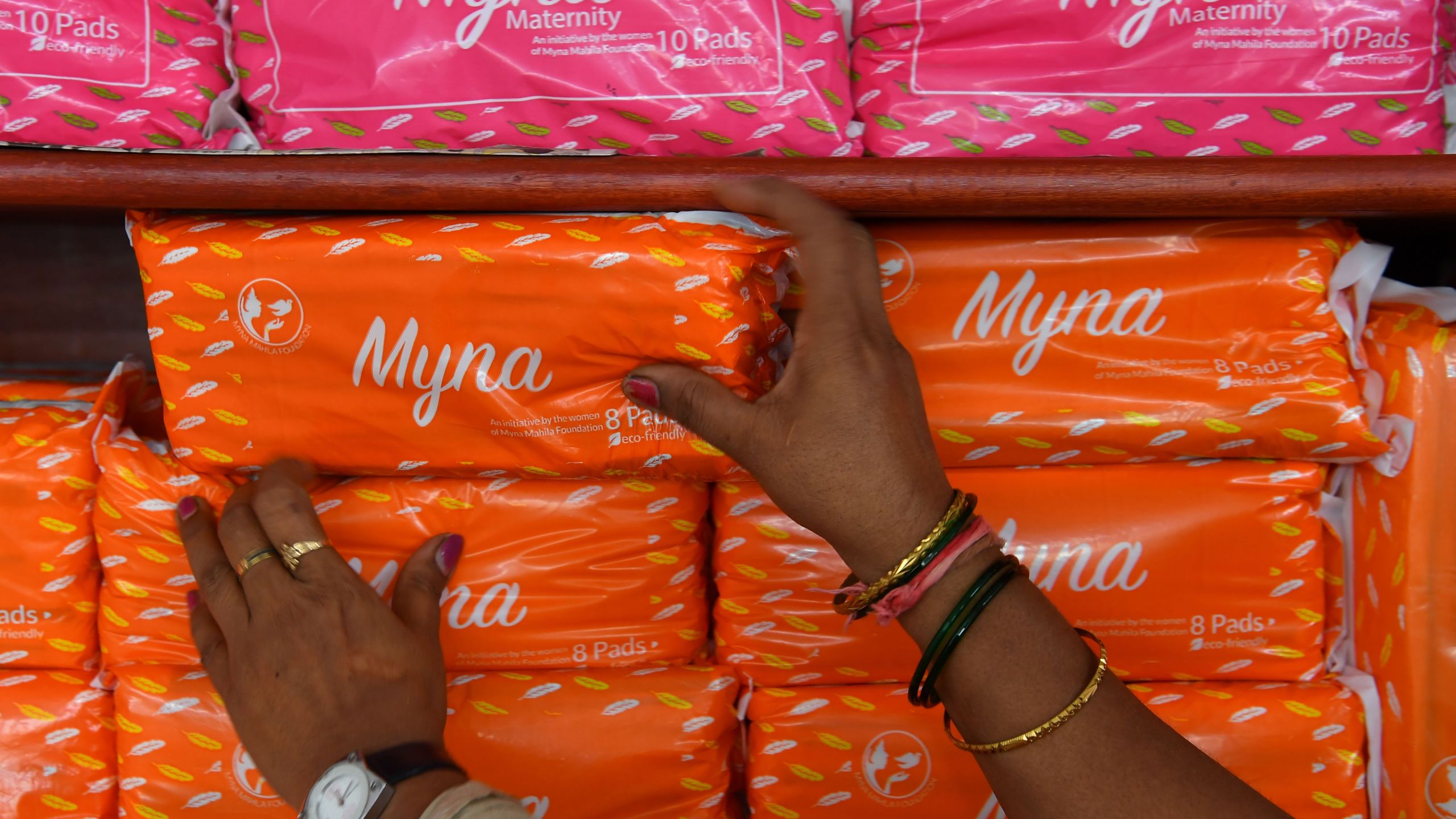 An Indian employee at the Myna Mahila Foundation arranges packets of sanitary pads at their office in Mumbai on April 10, 2018. (INDRANIL MUKHERJEE/AFP via Getty Images)