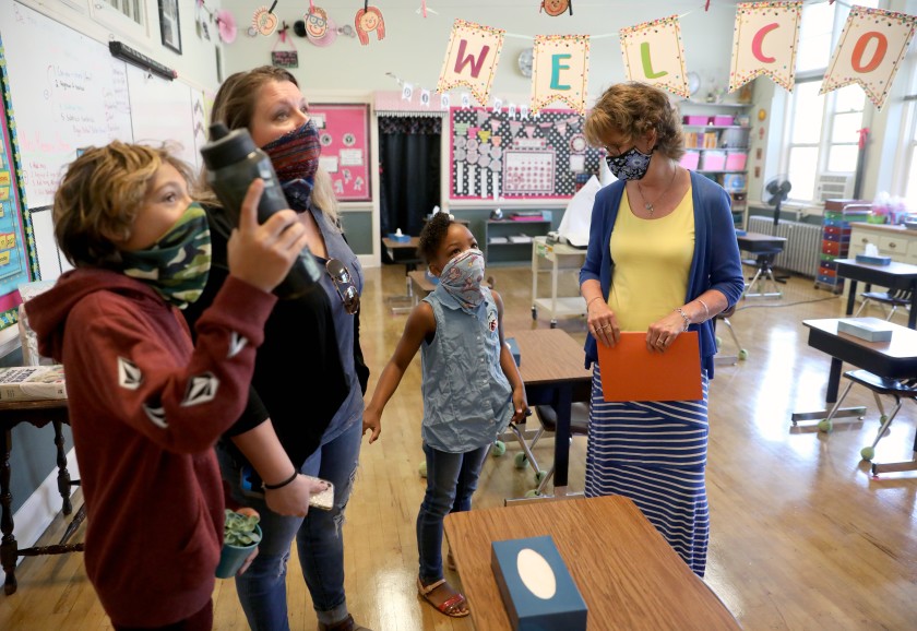 Students, teachers and parents visit a classroom at Mount St. Mary’s Academy, a private Catholic grade school in Grass Valley, Calif. (Gary Coronado / Los Angeles Times)