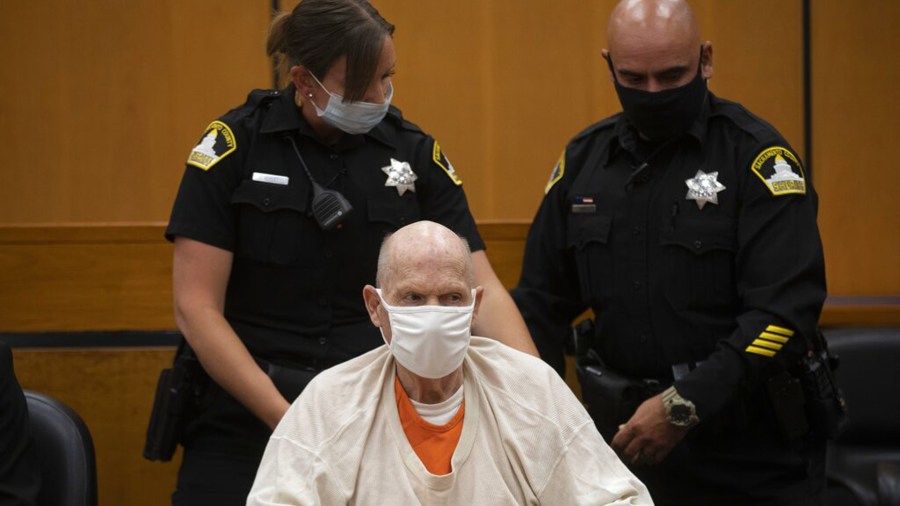 Joseph James DeAngelo, sitting in a wheelchair, is brought out of the courtroom for a break in the schedule for the third day of victim impact statements at the Gordon D. Schaber Sacramento County Courthouse on Aug. 20, 2020, in Sacramento. (Santiago Mejia/San Francisco Chronicle via AP, Pool)