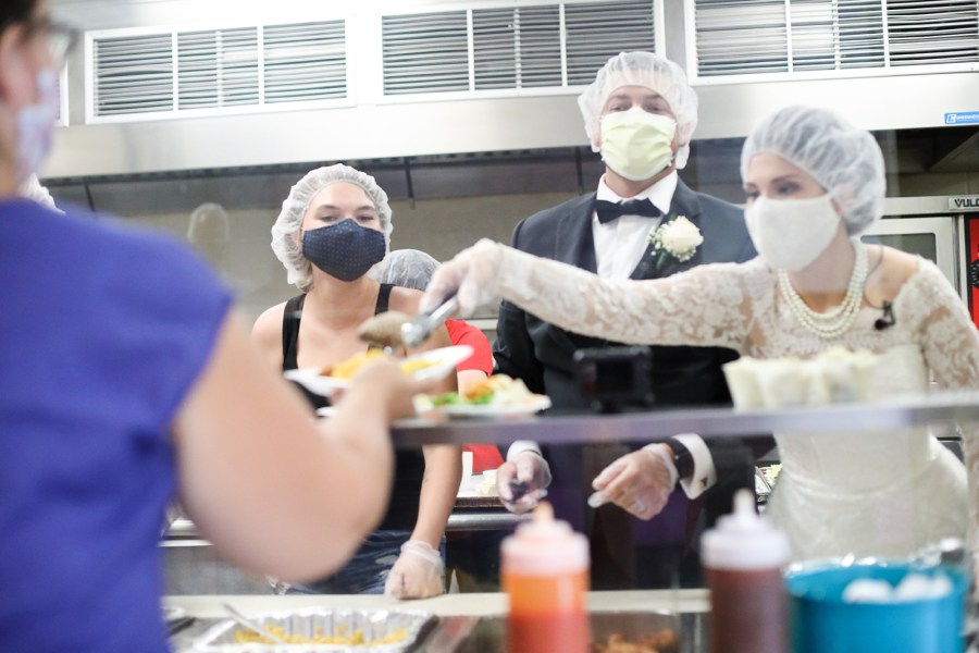 Tyler and Melanie Tapajna turned their canceled reception into an act of service by donating their reception food to a local women's shelter. (Caroline Stoltzfus/City Mission via CNN)