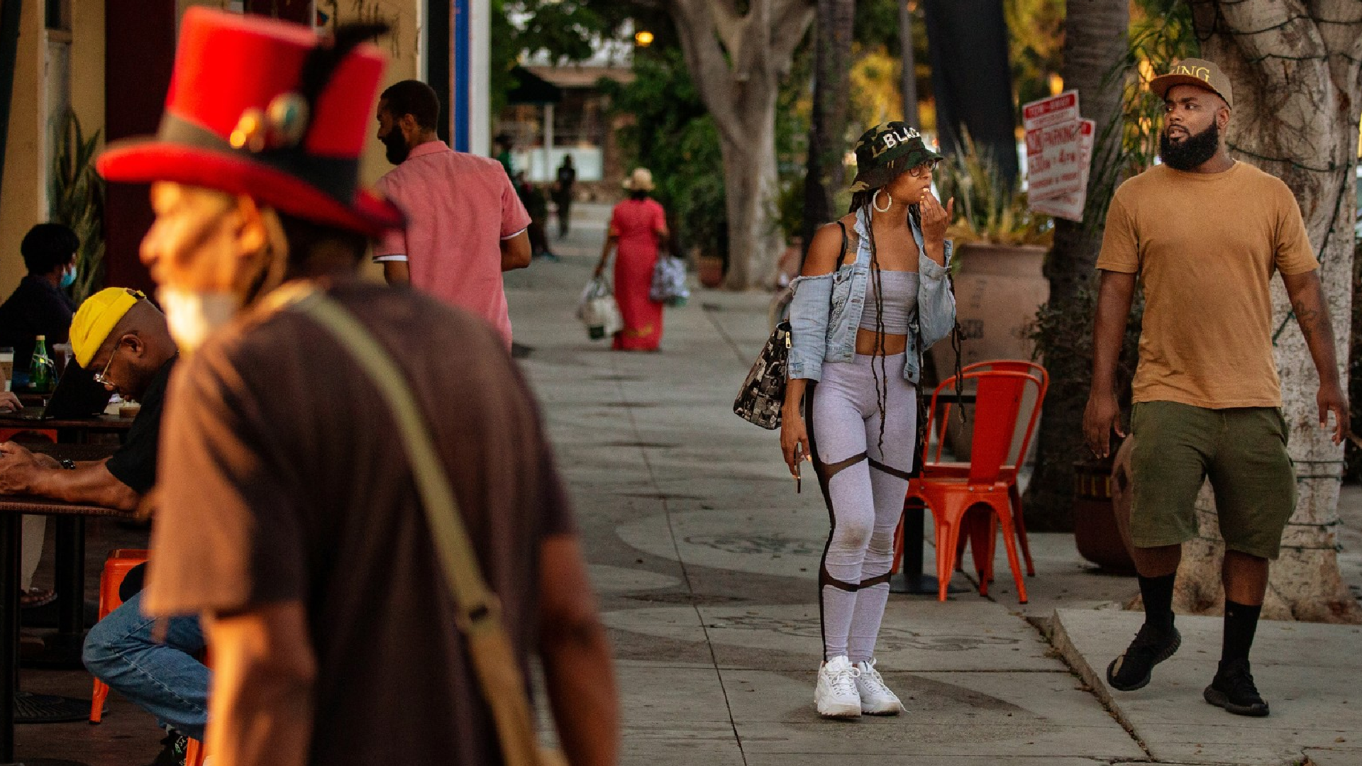 People enjoy an evening in Leimert Park - a neighborhood that is considered the cultural hub for Black culture.(Jason Armond / Los Angeles Times)