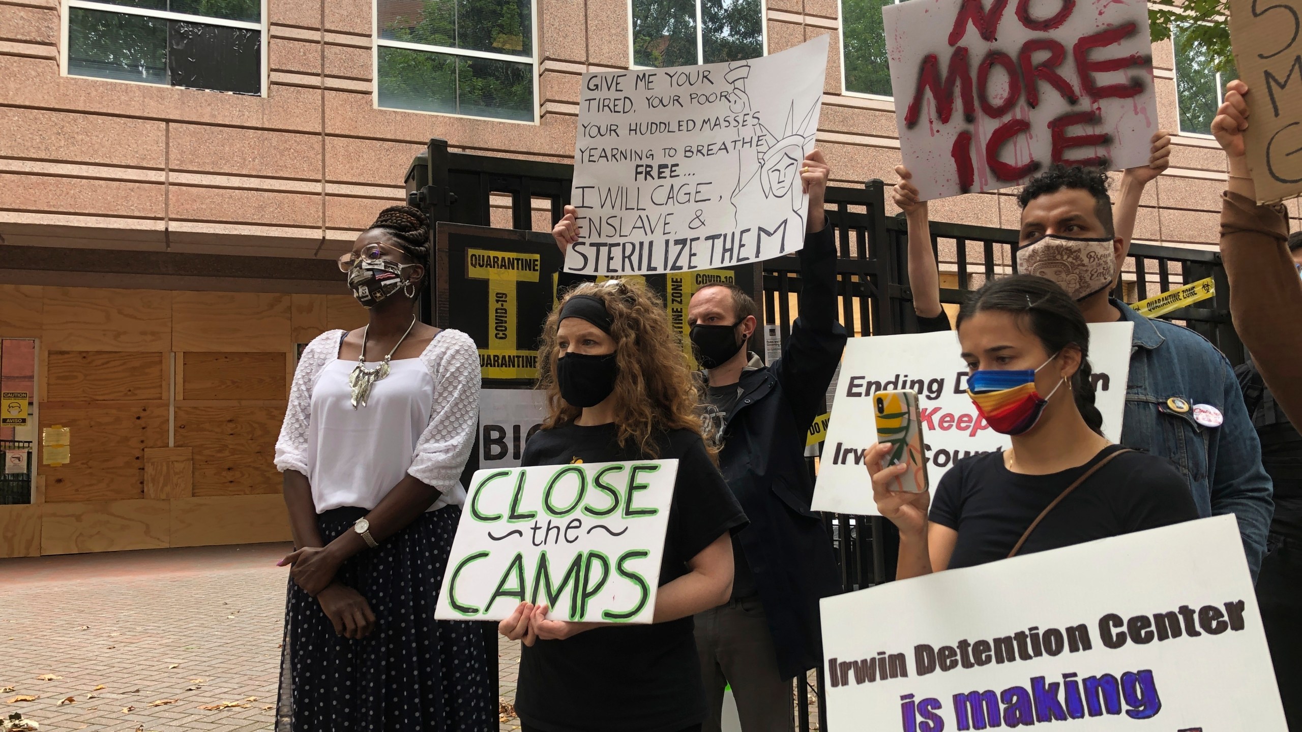 Dawn Wooten, left, a nurse at Irwin County Detention Center in Ocilla, Georgia, speaks at a Sept. 15, 2020 news conference in Atlanta protesting conditions at the immigration jail. (Jeff Amy / Associated Press)