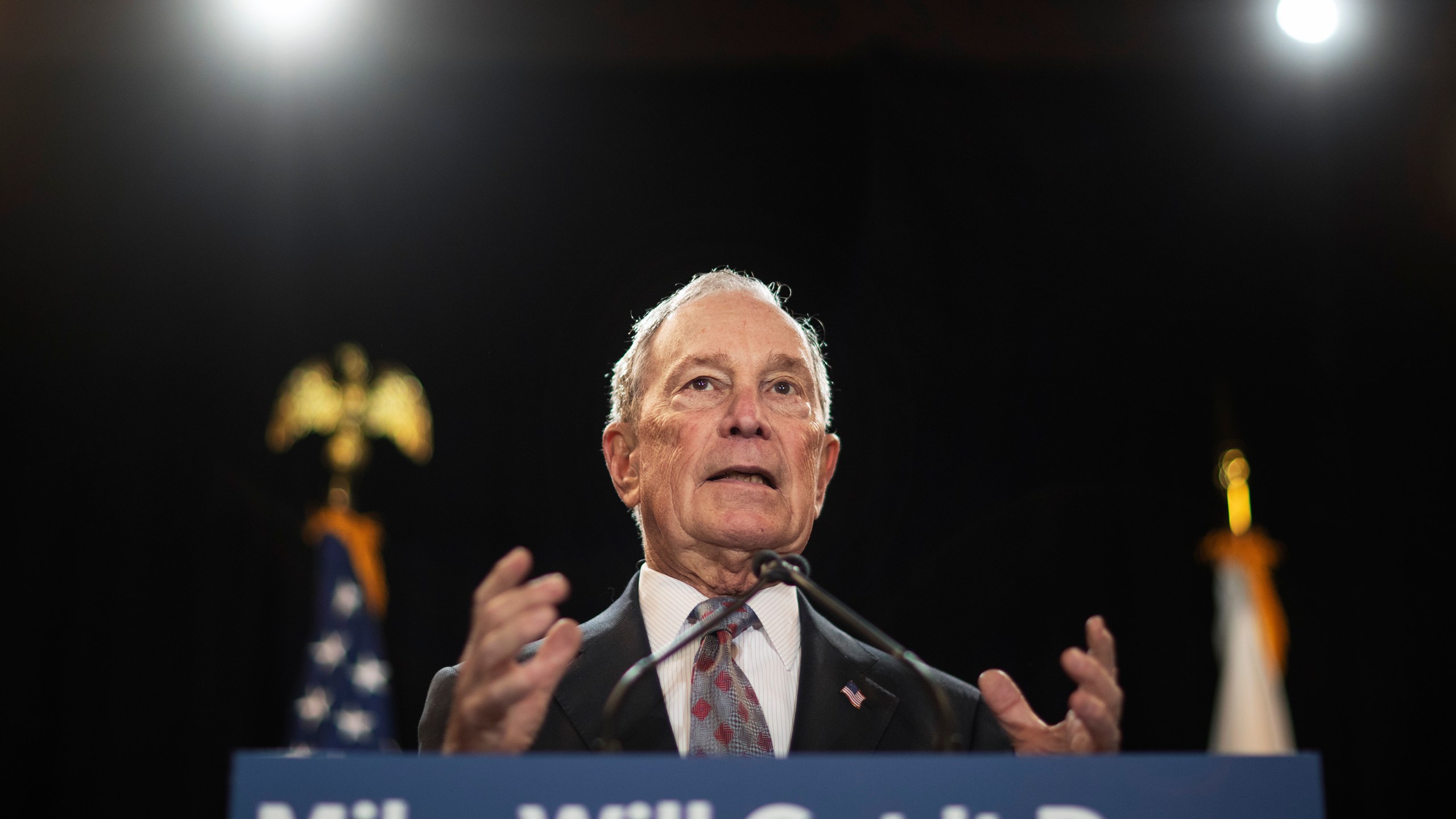 In this Feb. 5, 2020, file photo, then-Democratic presidential candidate and former New York City Mayor Michael Bloomberg speaks at a campaign event in Providence, R.I. Bloomberg has come through on his vow to spend “whatever it takes” to defeat President Donald Trump. The former presidential candidate has pledged to spend $100 million in Florida to boost Joe Biden there. (AP Photo/David Goldman, File)