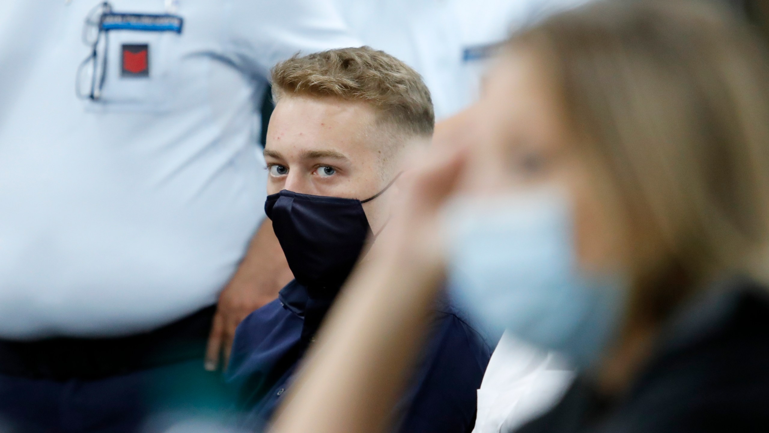 Finnegan Lee Elder, from San Francisco, looks on during a break in his trial where he and his friend Gabriel Natale-Hjorth are accused of slaying a plainclothes Carabinieri officer while on vacation in Italy last summer, in Rome, Wednesday, Sept. 16, 2020. (Remo Casilli/Pool Photo via AP)