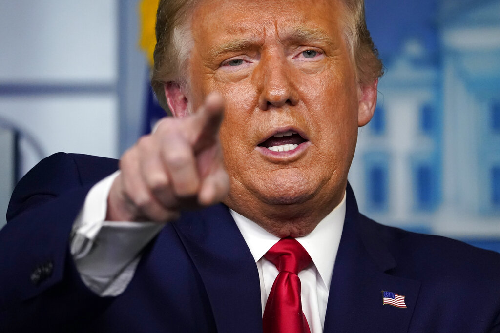 President Donald Trump gestures while speaking during a news conference at the White House, Wednesday, Sept. 16, 2020, in Washington. (AP Photo/Evan Vucci)