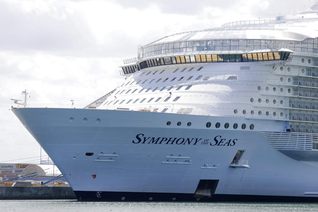 The Symphony of the Seas cruise ship is shown docked at PortMiami, in a Wednesday, May 20, 2020, file photo, in Miami. (AP Photo/Wilfredo Lee, File)