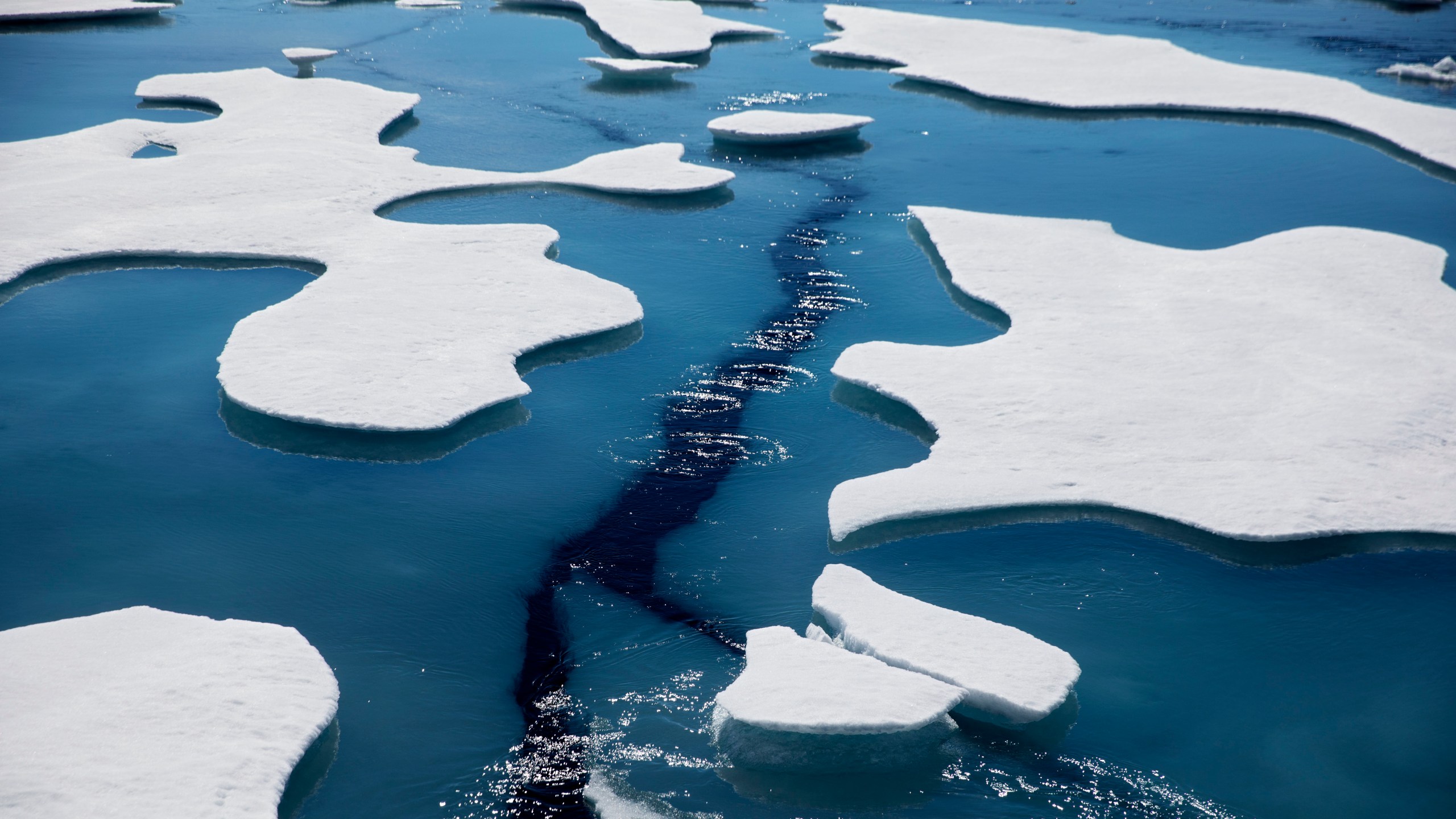 Sea ice breaks apart as the Finnish icebreaker MSV Nordica traverses the Northwest Passage through the Victoria Strait in the Canadian Arctic Archipelago in a Friday, July 21, 2017 file photo. (David Goldman/Associated Press)