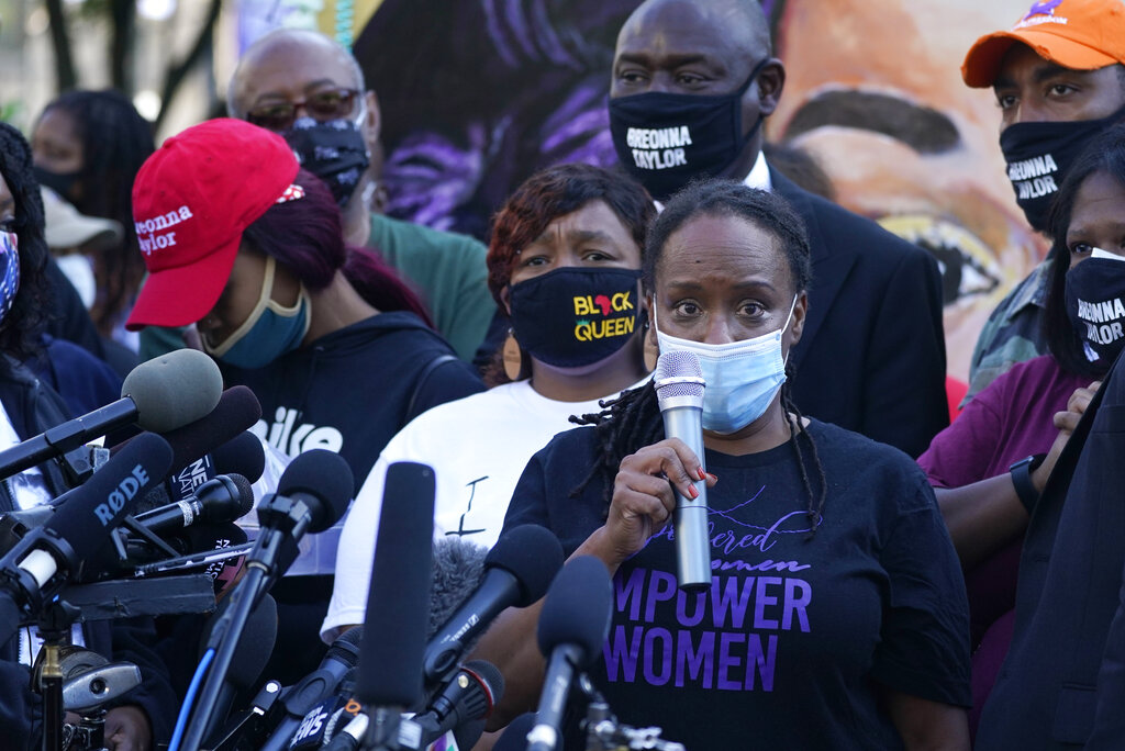 State Rep. Attica Scott speaks during a news conference, Friday, Sept. 25, 2020, in Louisville, Ky. (AP Photo/Darron Cummings)